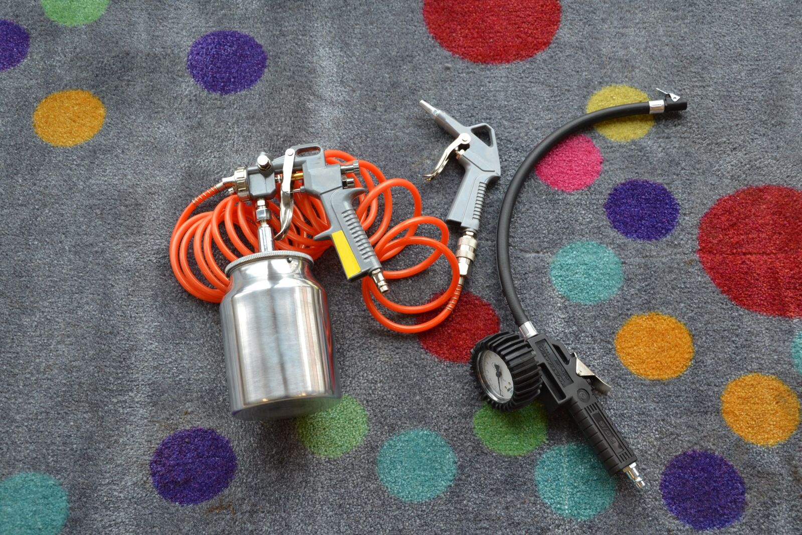 Nikon D3100 sample photo. Compressor, gun, tool photography