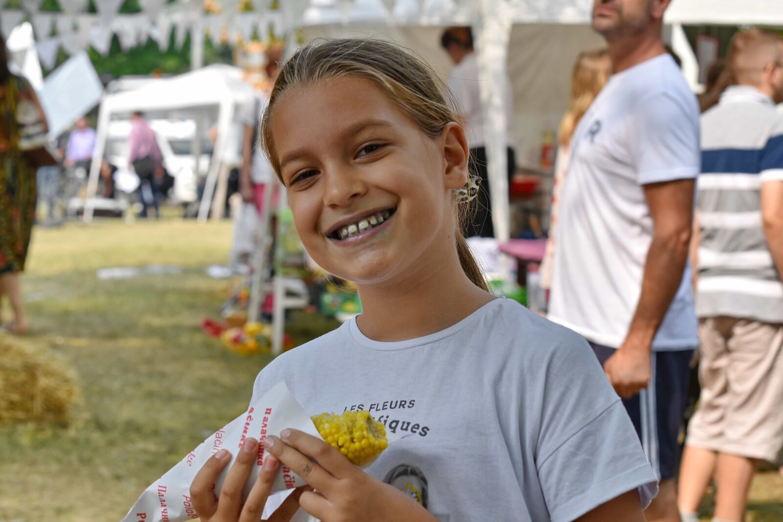 Nikon D5500 sample photo. Carnival, corn, eating, festival photography