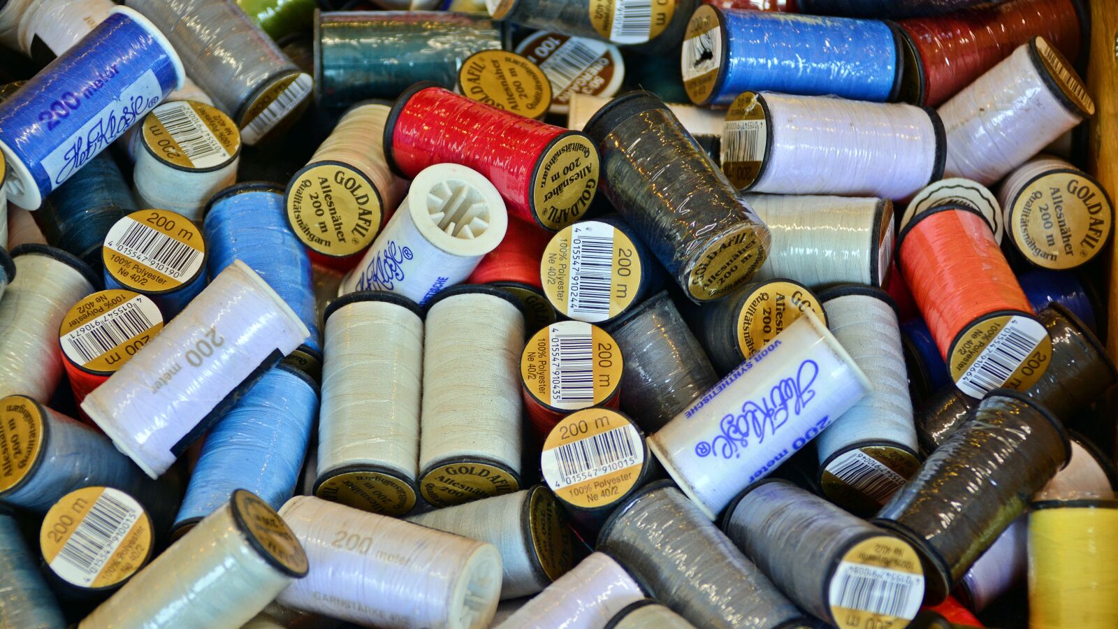 Nikon D5200 sample photo. Sewing thread, bobbin, thread photography