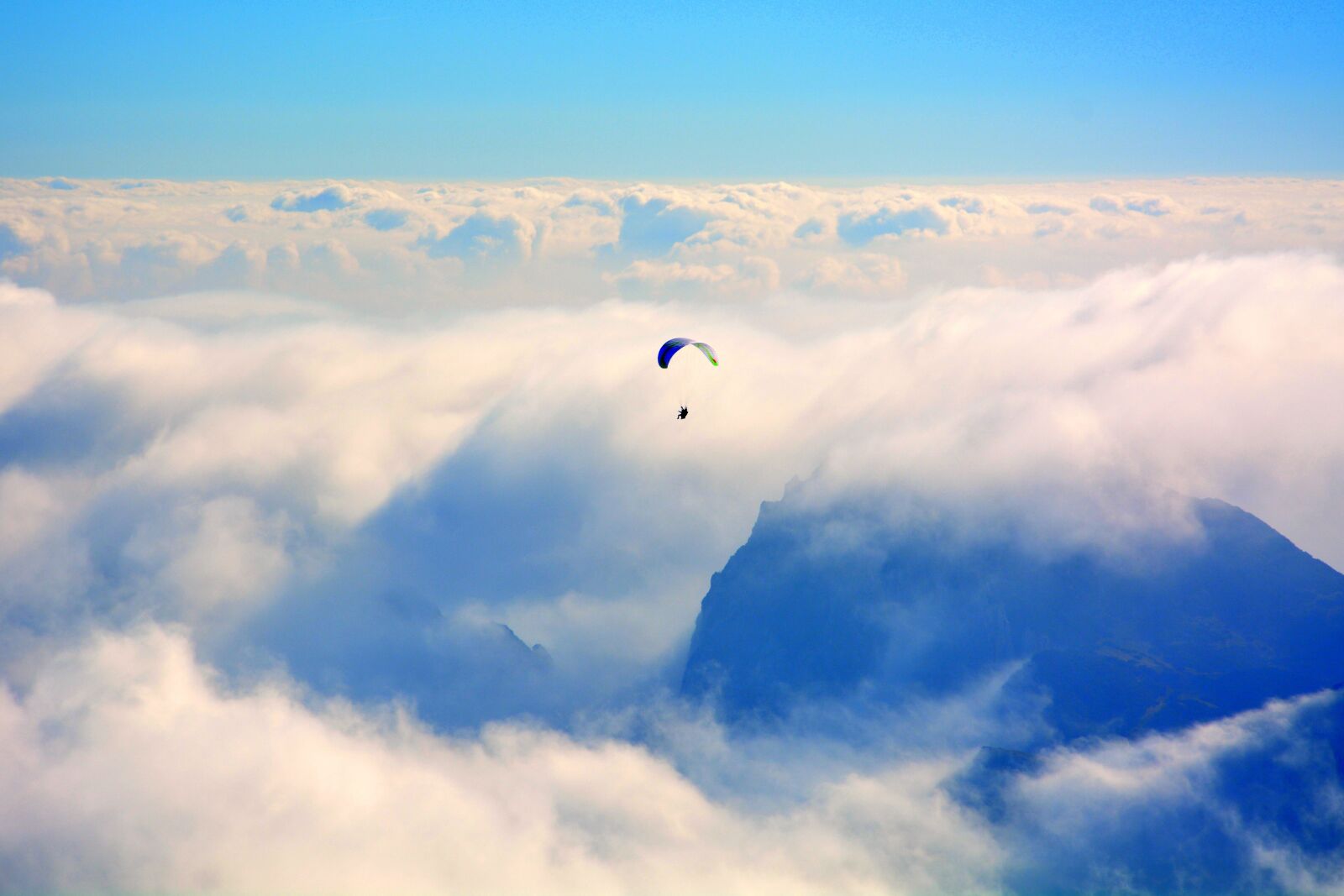Nikon D7100 sample photo. Paragliding, clouds, mountain photography