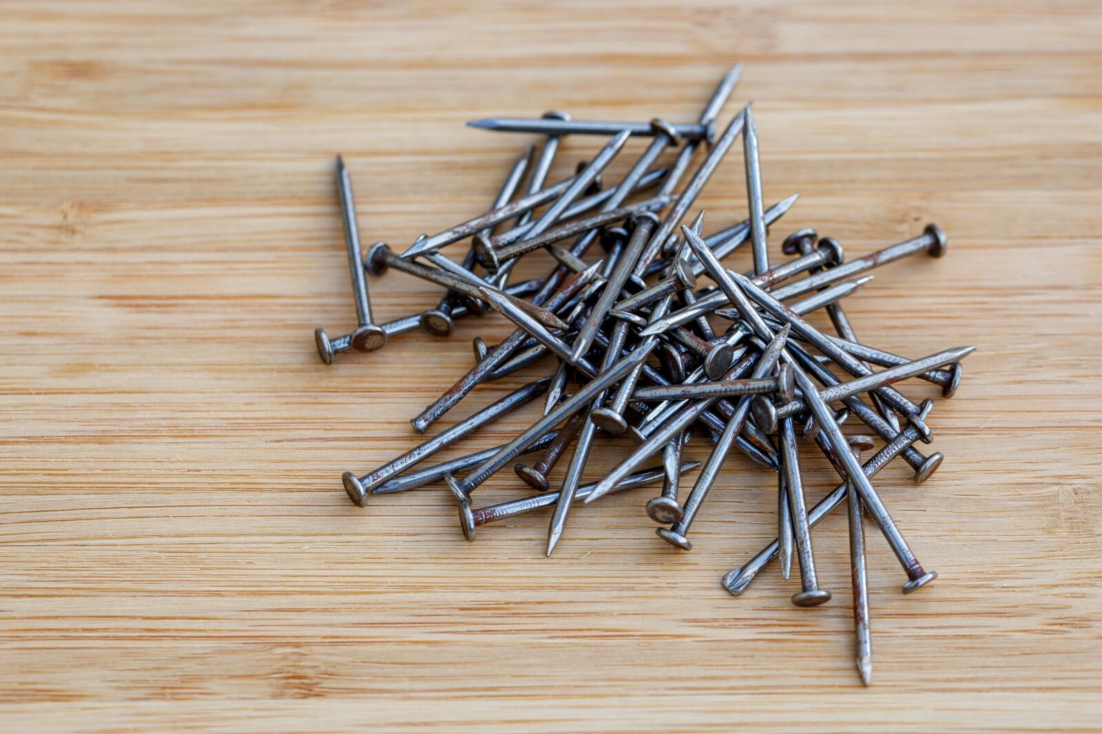 Canon EF 100mm F2.8L Macro IS USM sample photo. Nails, pile, metal photography