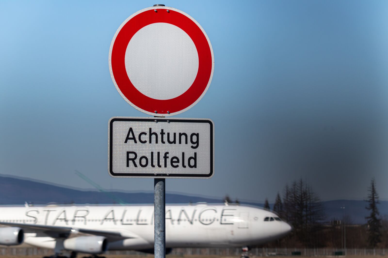 Canon EOS 77D (EOS 9000D / EOS 770D) sample photo. Airplane, vehicle, sign photography