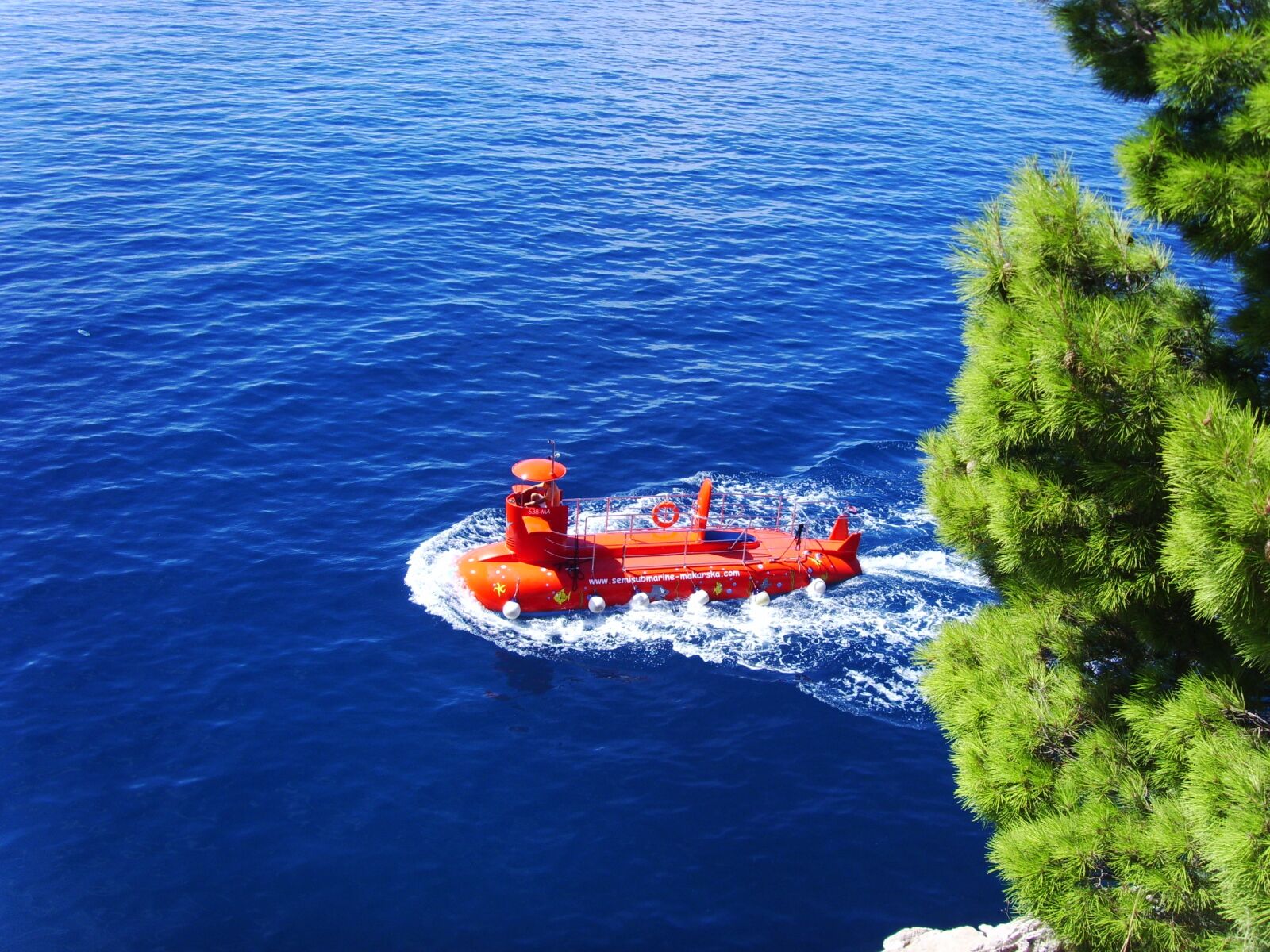 DIGITAL CAM sample photo. Blue sea, red u-boat photography