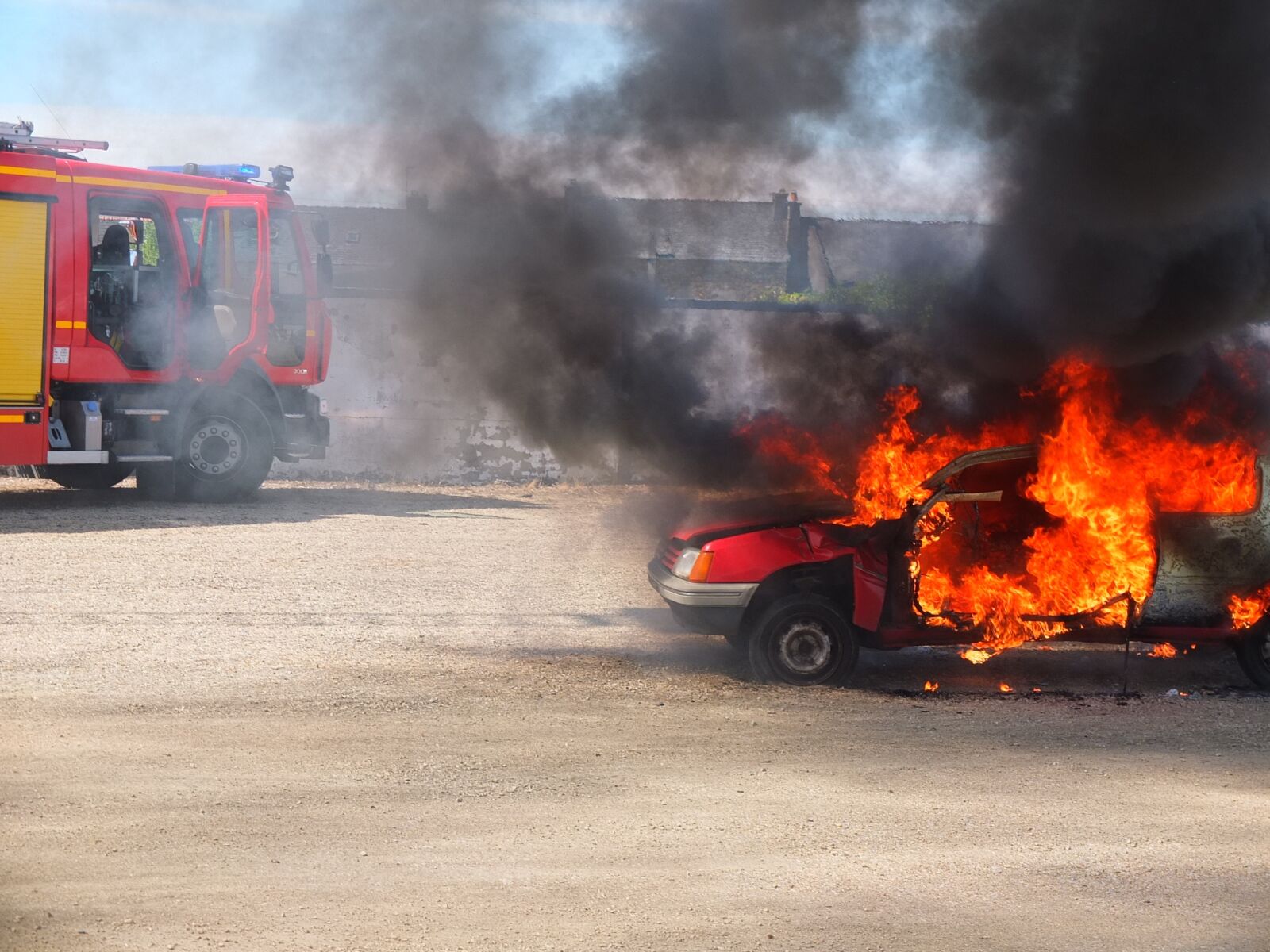 Fujifilm X10 sample photo. Fire, firefighter, relief photography
