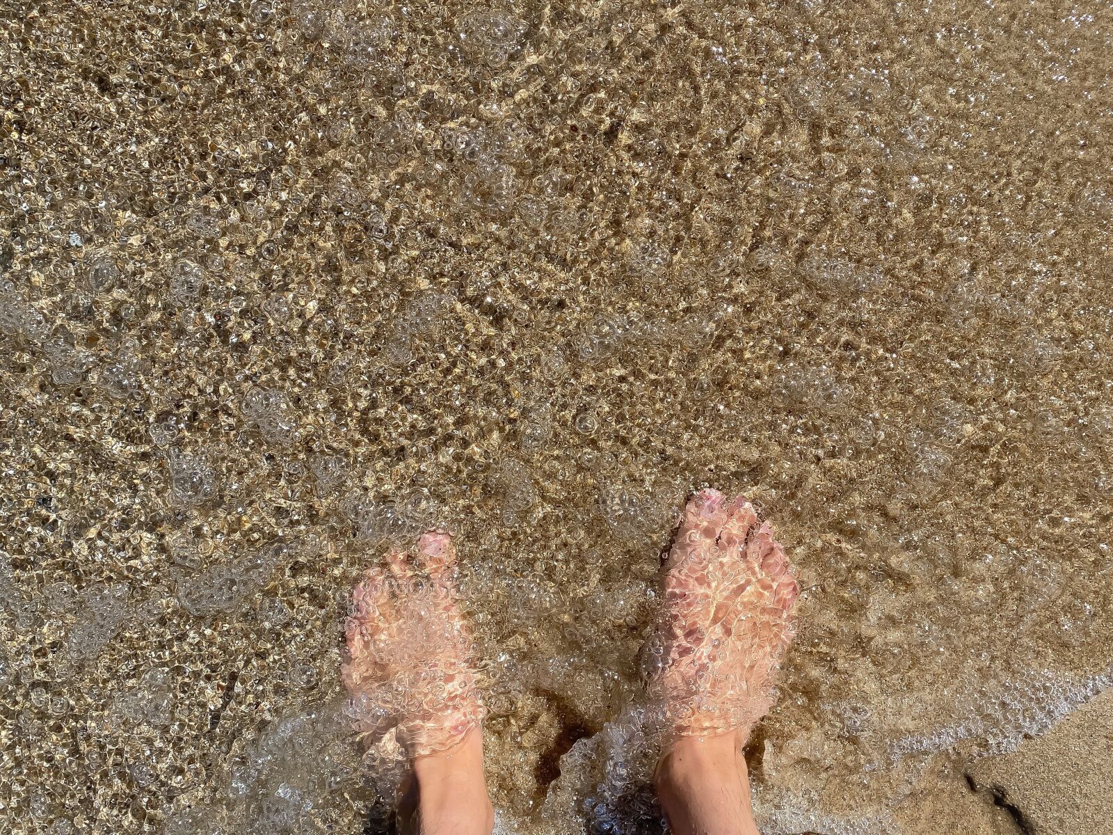 iPhone 11 Pro back triple camera 4.25mm f/1.8 sample photo. Barefoot, feet, beach photography