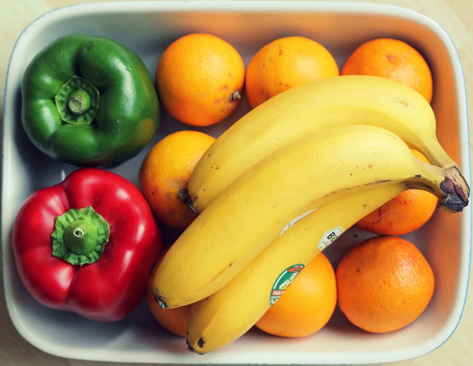 Canon EOS 550D (EOS Rebel T2i / EOS Kiss X4) + Canon EF 50mm F1.8 II sample photo. Fruits, orange, banana photography