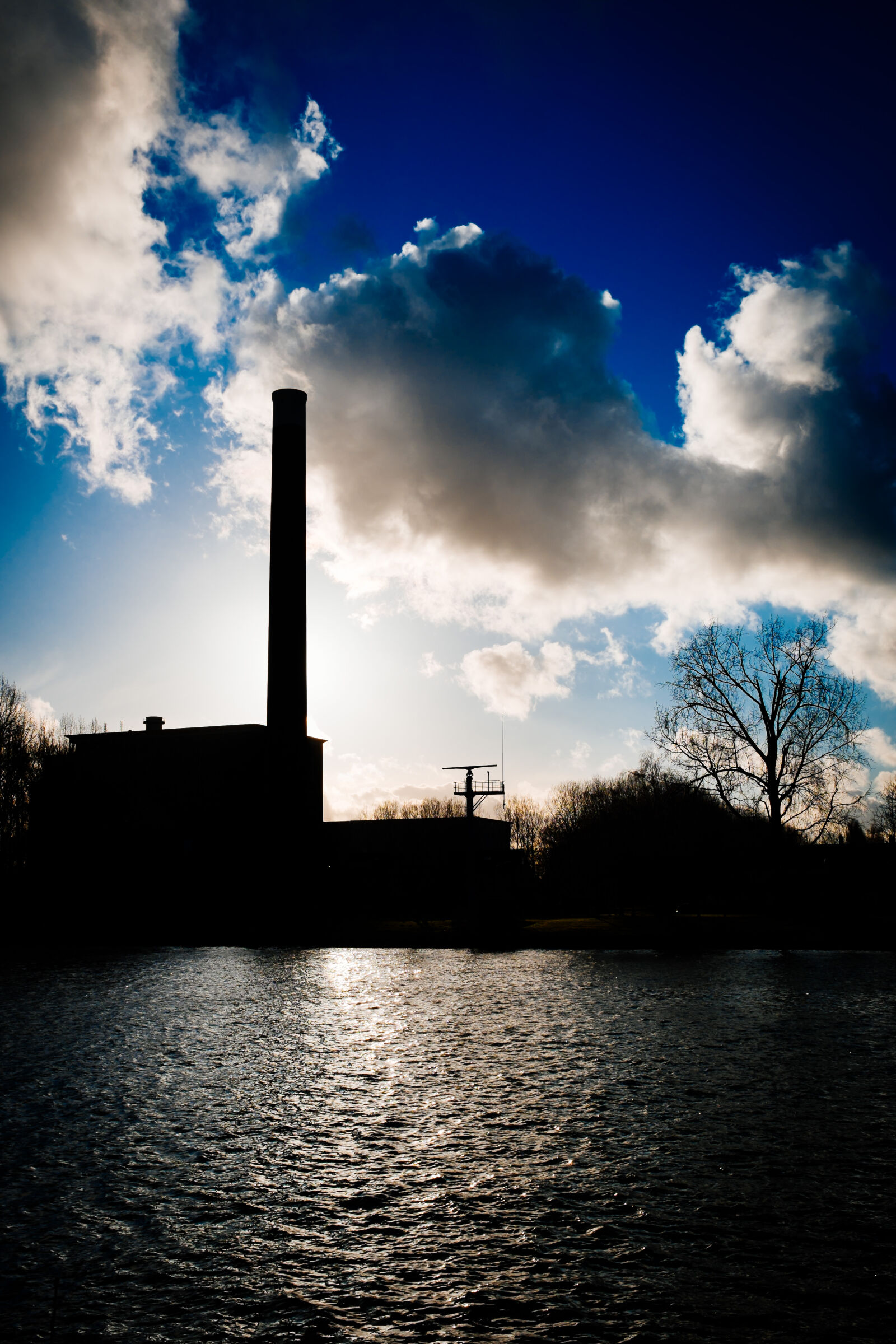 Fujifilm X100S sample photo. Clouds, factory, water photography