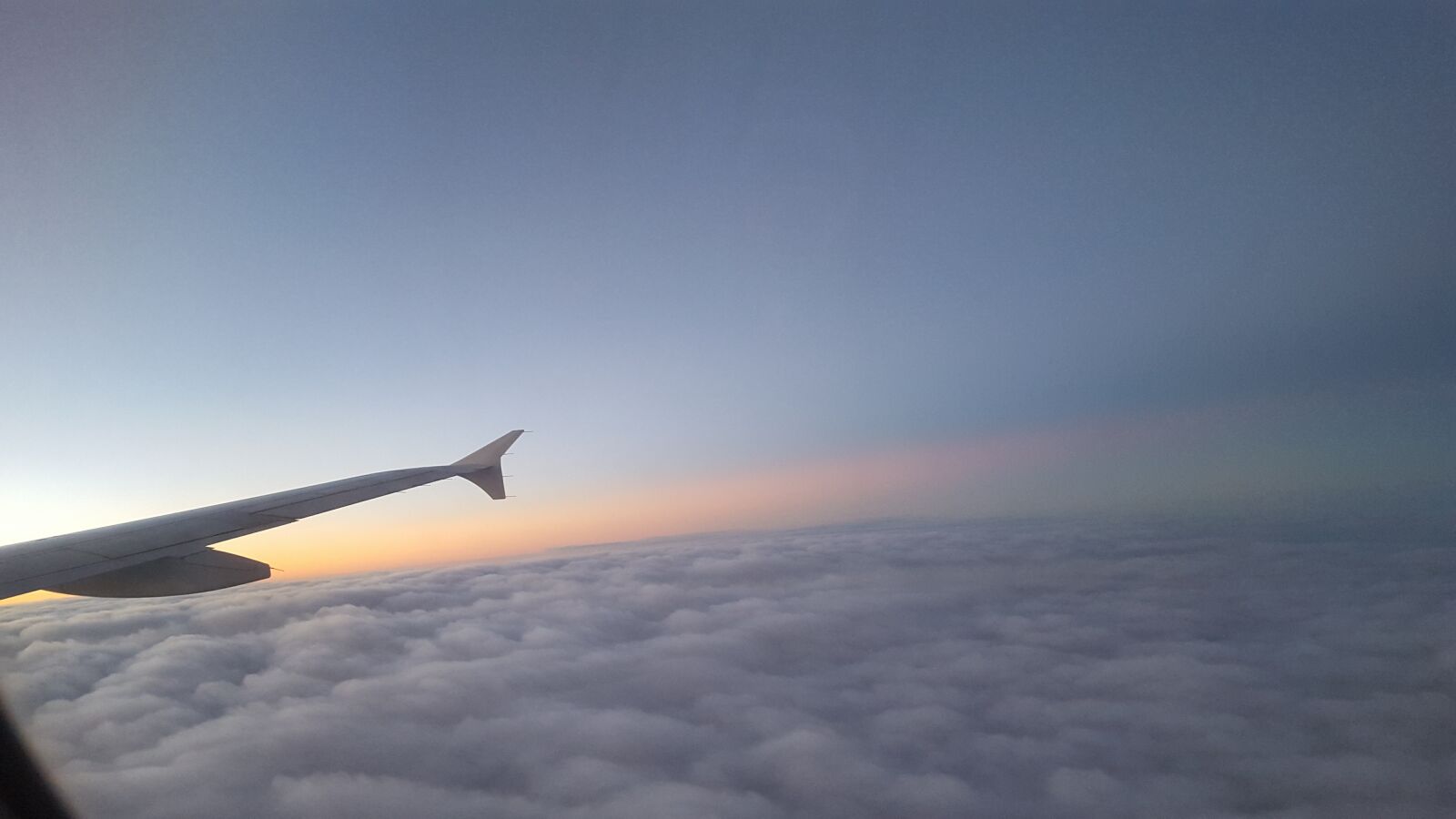 Samsung Galaxy S6 sample photo. Wing, over, the cloud photography
