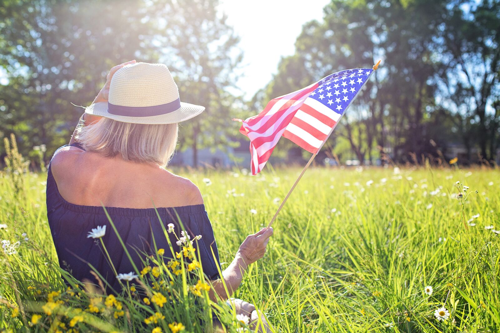 Canon EF 50mm F1.4 USM sample photo. Fourth of july, waving photography