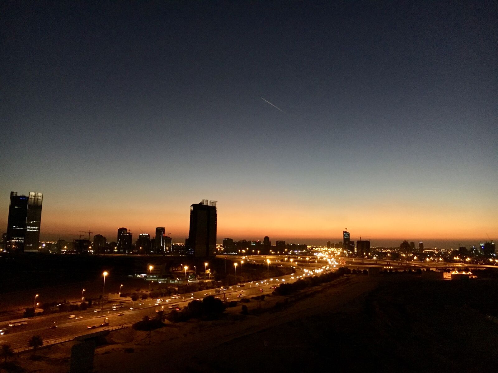 Apple iPhone 6s sample photo. Illuminated, cityscape, against, sky photography
