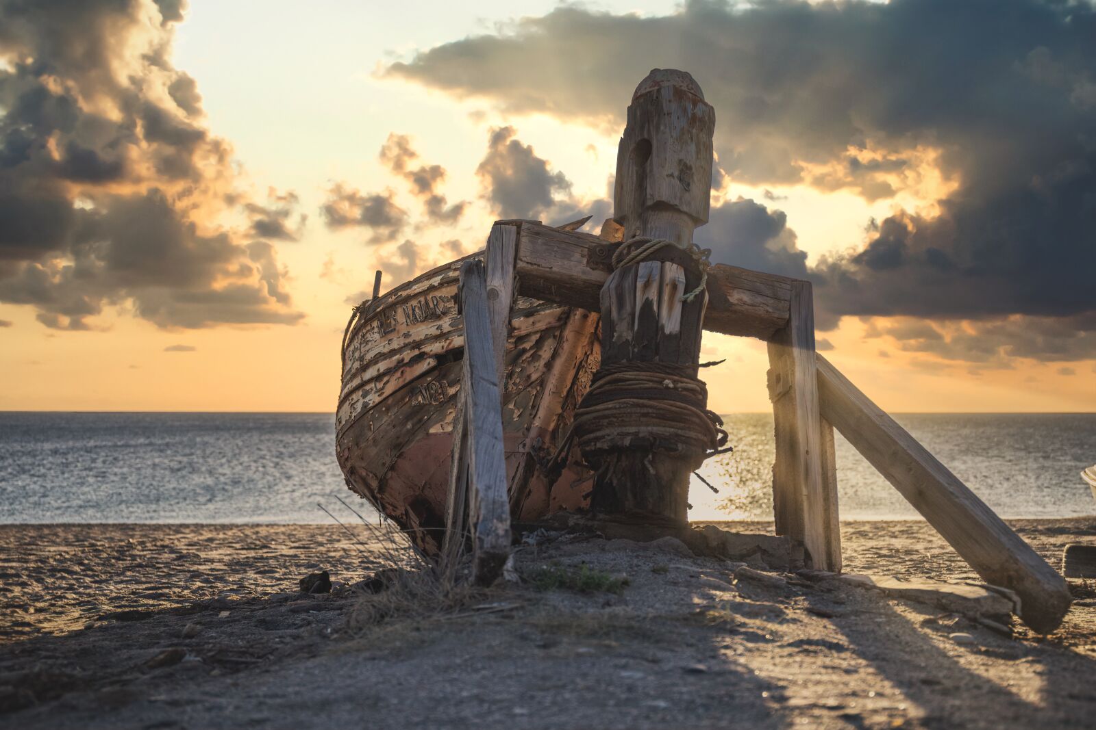 Canon EF 24-70mm F4L IS USM sample photo. Boat, sunset, dramatic photography