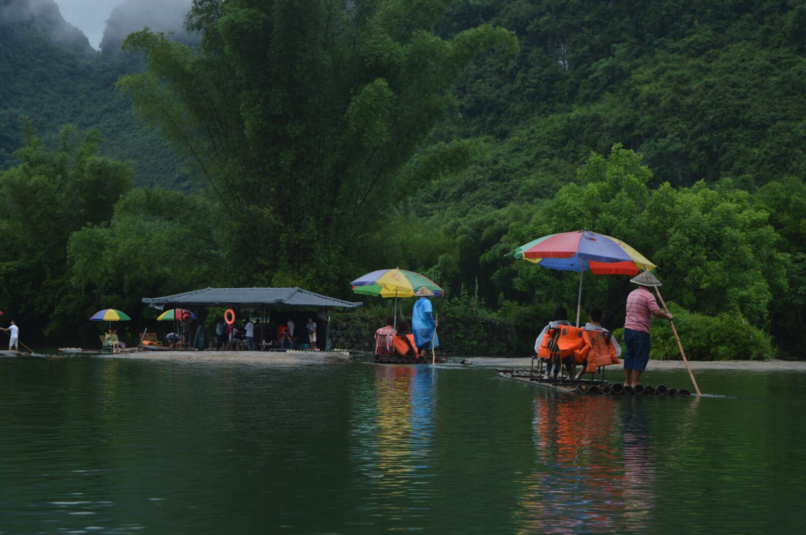 Nikon D3200 sample photo. Water, river, umbrella photography
