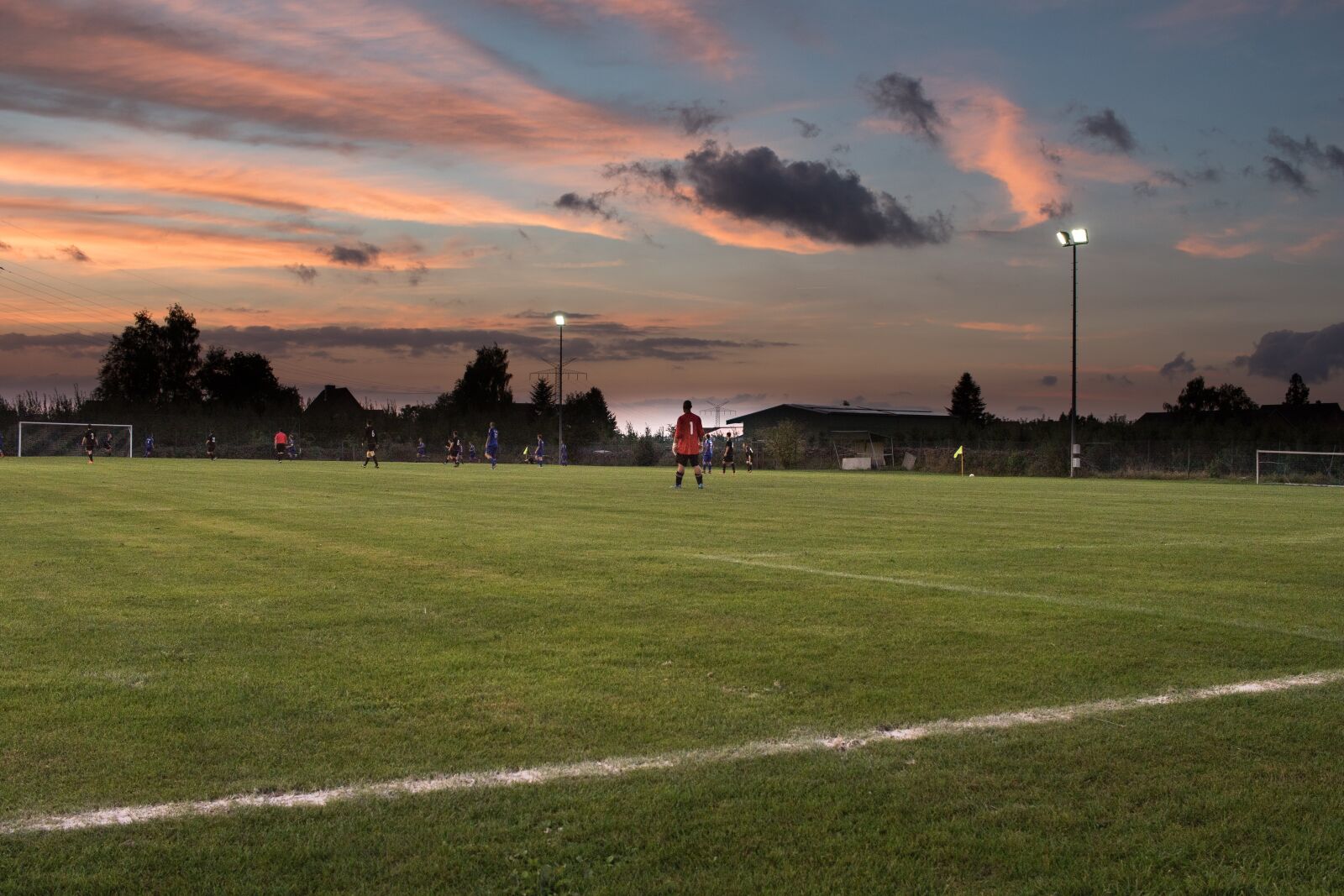 Canon EF-S 24mm F2.8 STM sample photo. Football match, twilight, floodlight photography