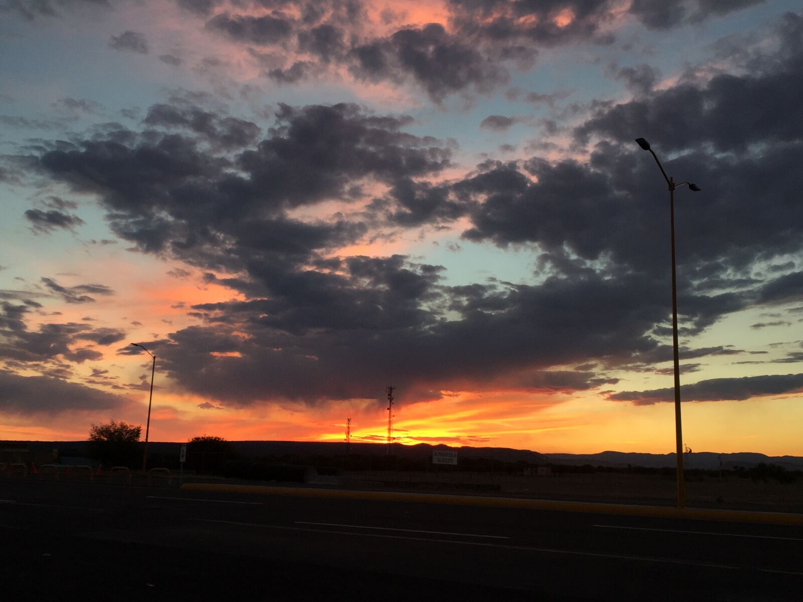 iPhone 6 back camera 4.15mm f/2.2 sample photo. Freeway, sunset photography