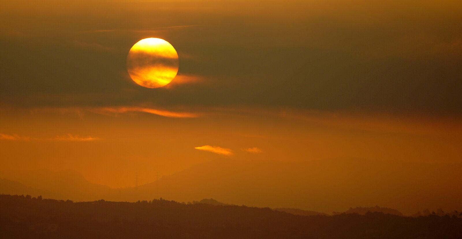 Sony E 55-210mm F4.5-6.3 OSS sample photo. Sunset, sun, sky photography