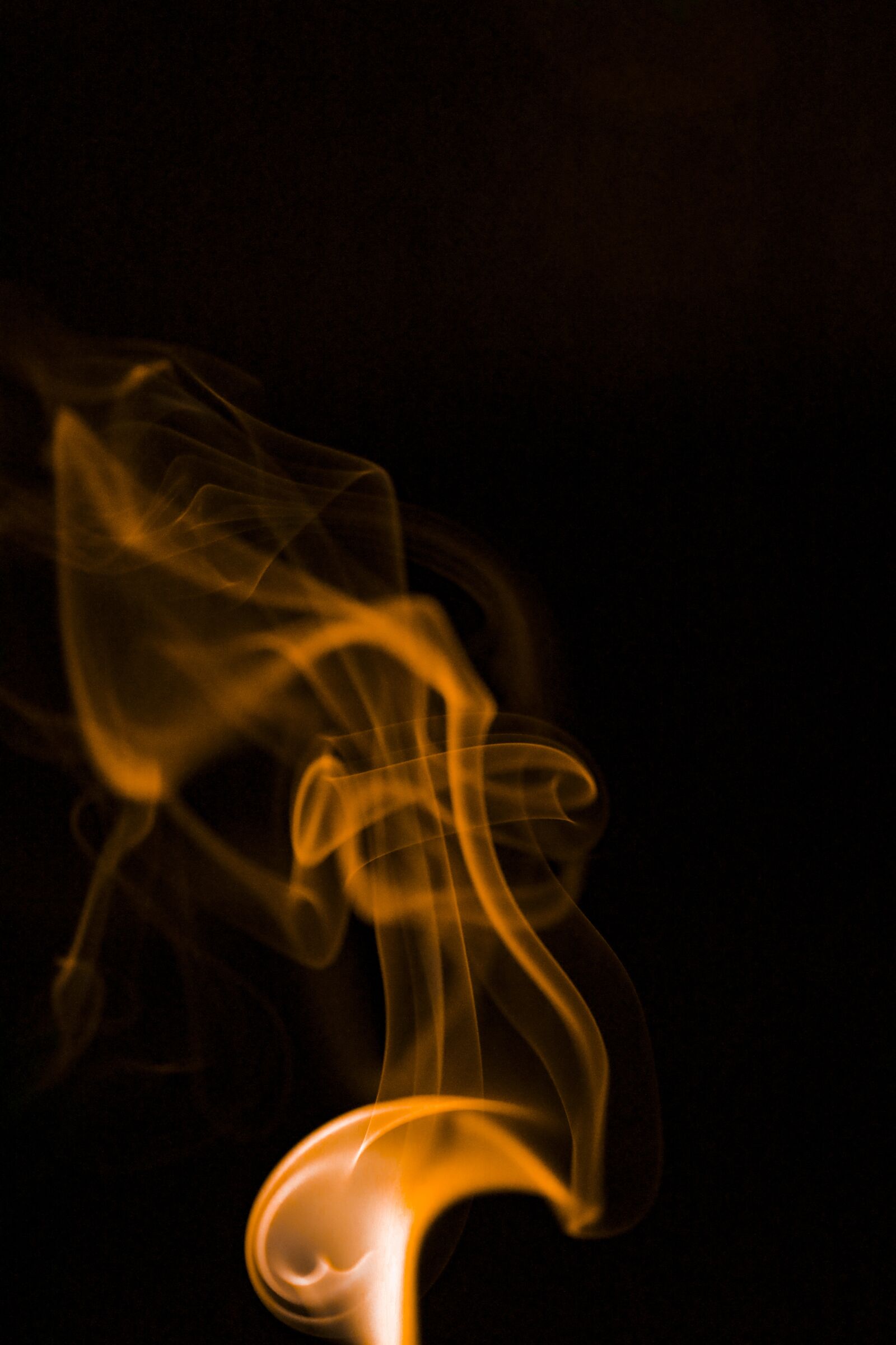 Canon EF 100mm F2.8L Macro IS USM sample photo. Smoke, orange, fire photography