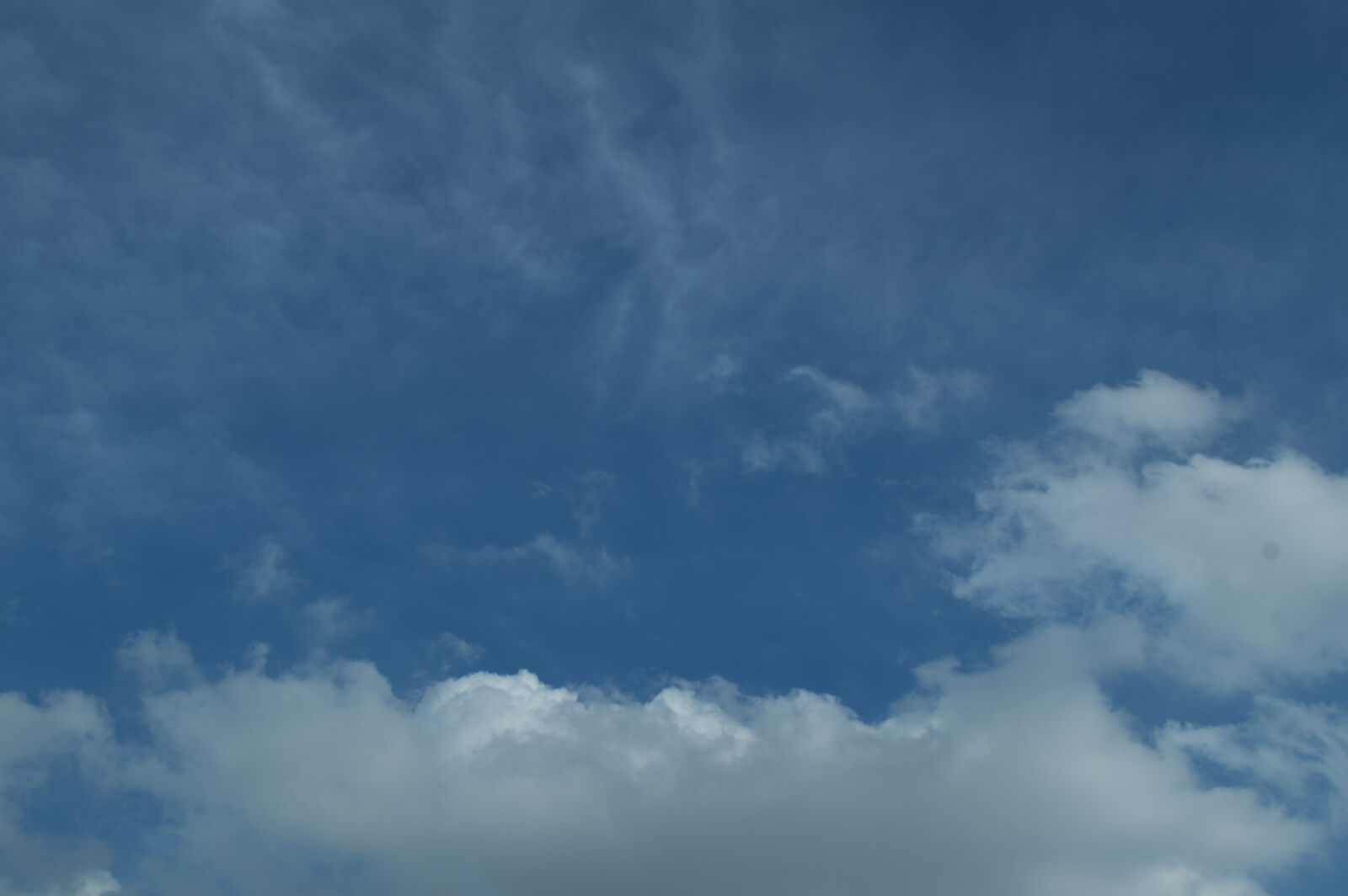 Nikon AF-S DX Nikkor 18-55mm F3.5-5.6G VR sample photo. Background, blue, cloud, dark photography
