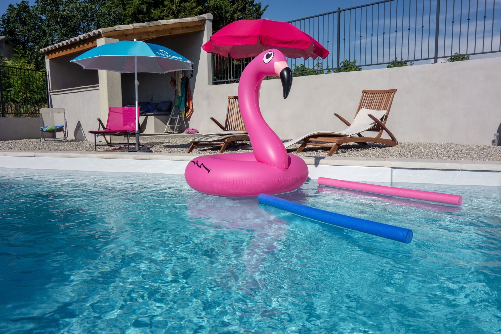 Sony Cyber-shot DSC-RX100 sample photo. Swimming pool, parasol, pink photography