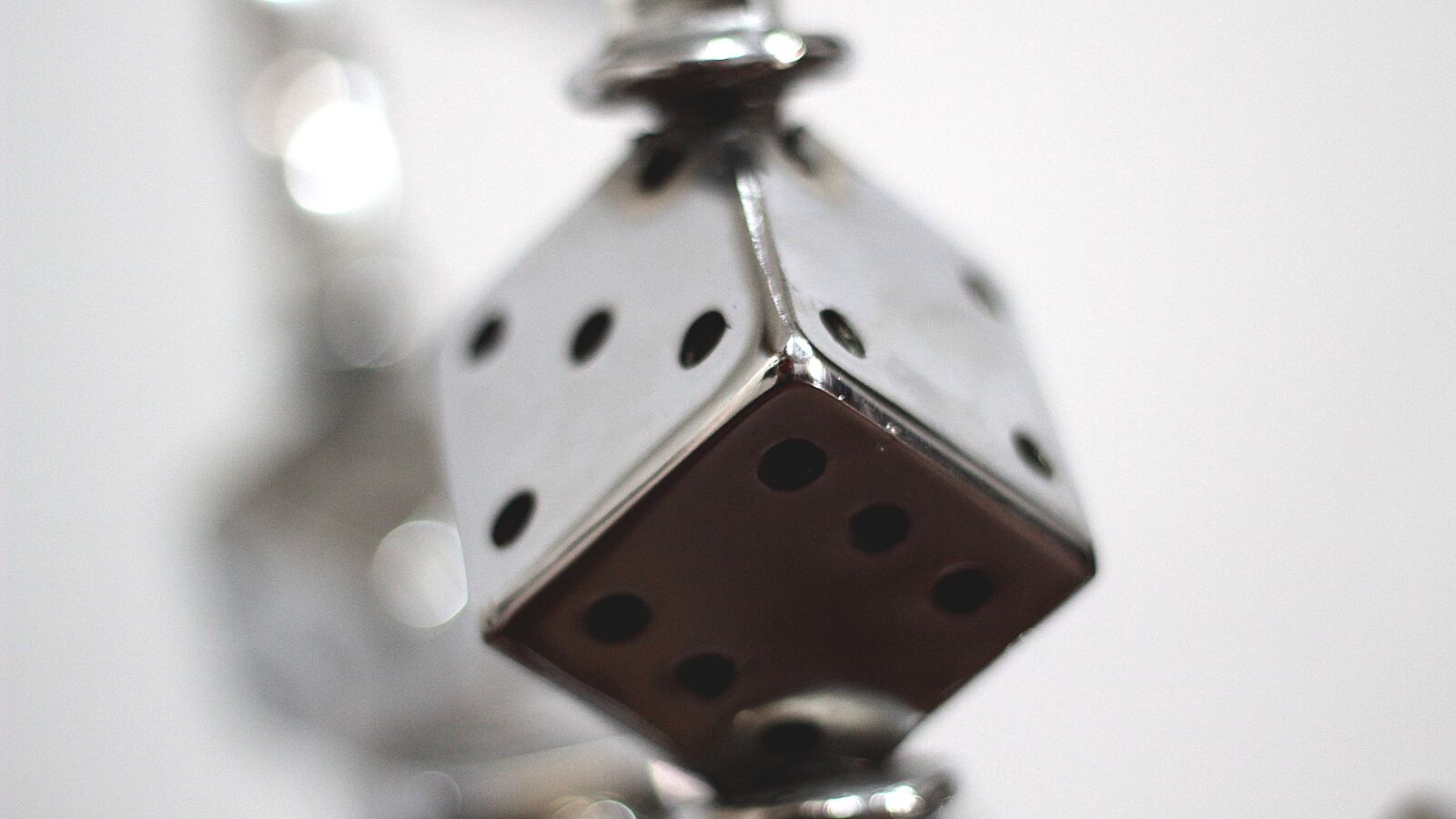 Canon EF 50mm F1.8 II sample photo. Dice, bike, steel photography