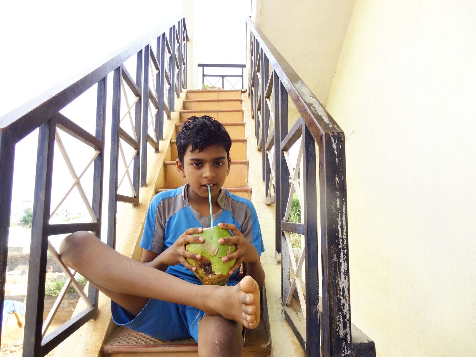 Sony Cyber-shot DSC-HX9V sample photo. Boy, drinking, tender, coconut photography