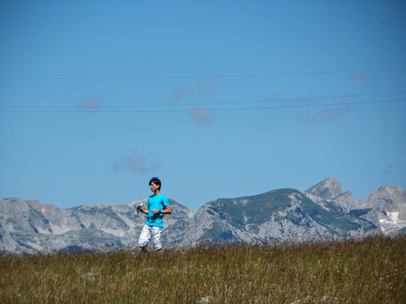Samsung ST200 / ST200F / ST201 / ST201F / ST205F sample photo. Field, grass, human, man photography