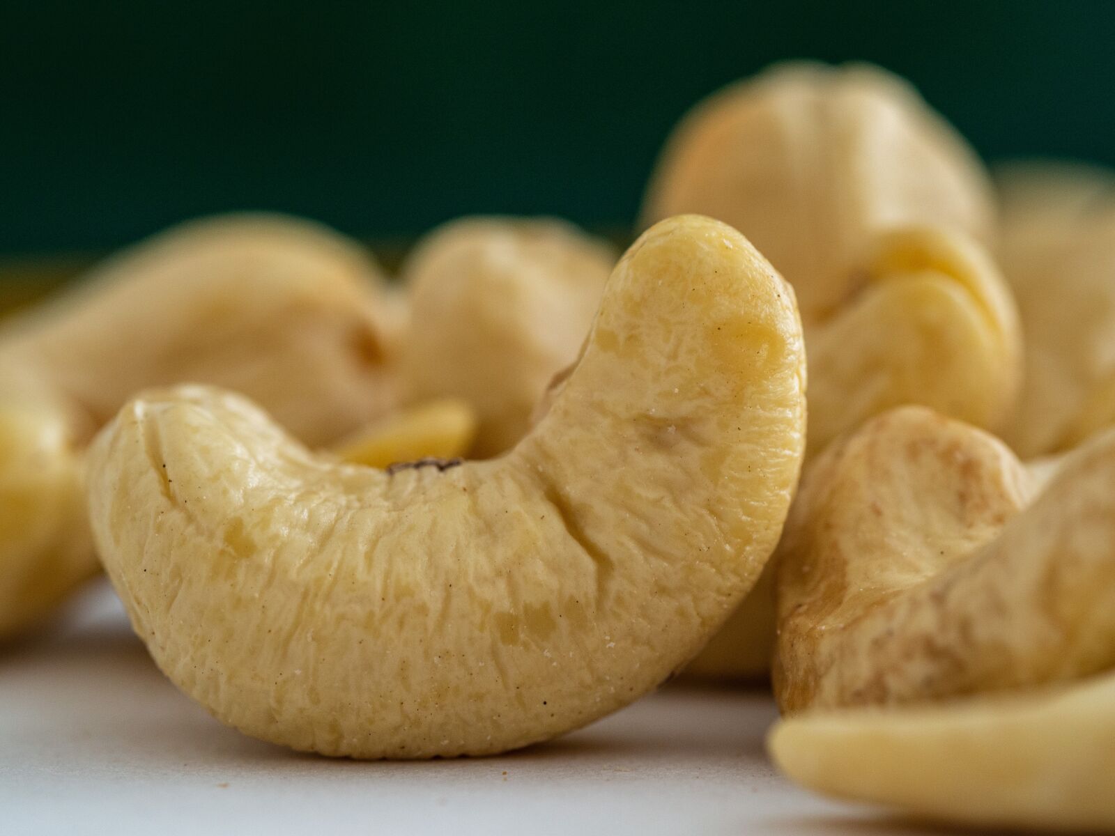 Olympus OM-D E-M10 III sample photo. Cashew, nuts, nutrition photography