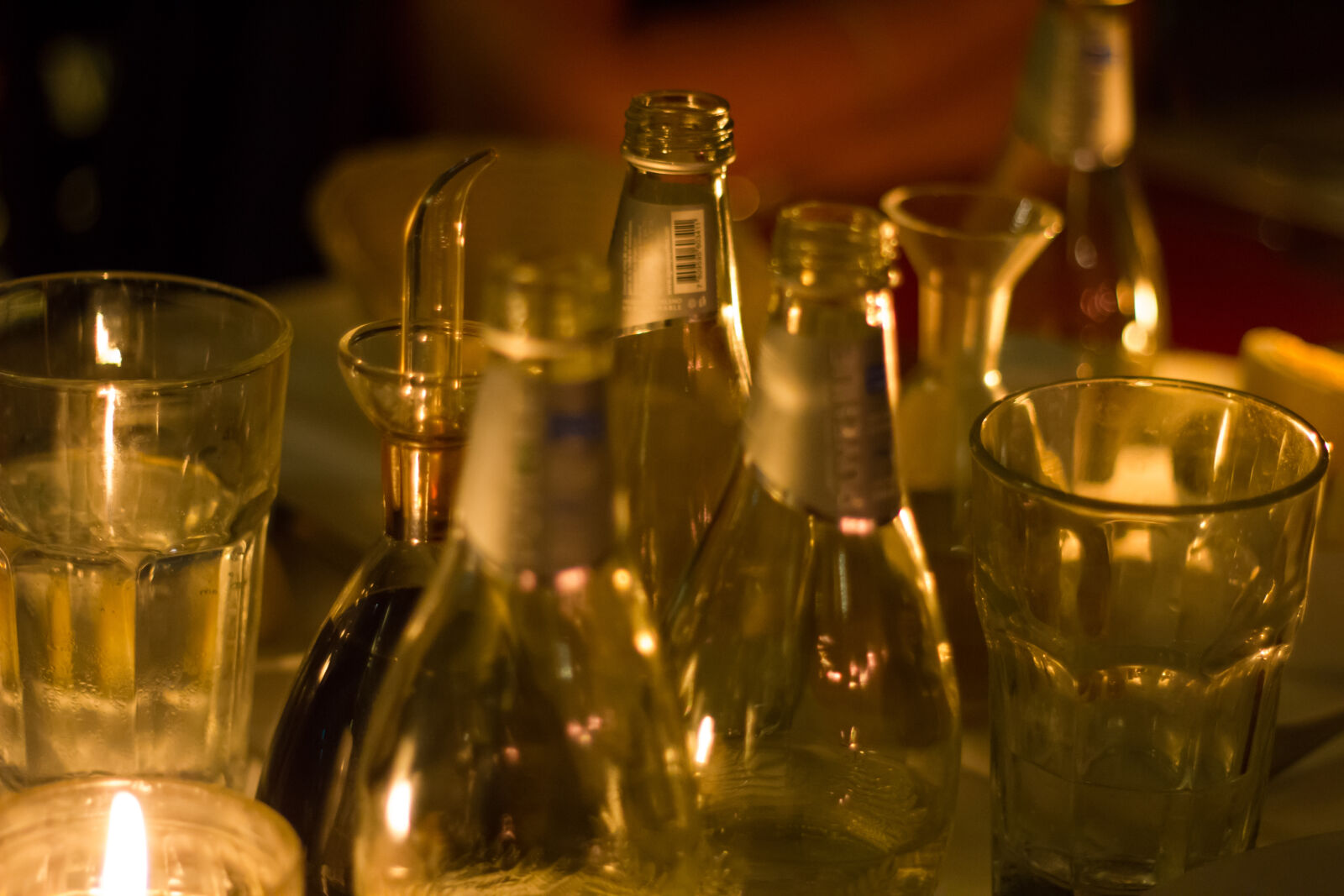 Canon EF 50mm F1.8 II sample photo. Bottles, candlelight, dinner, glass photography