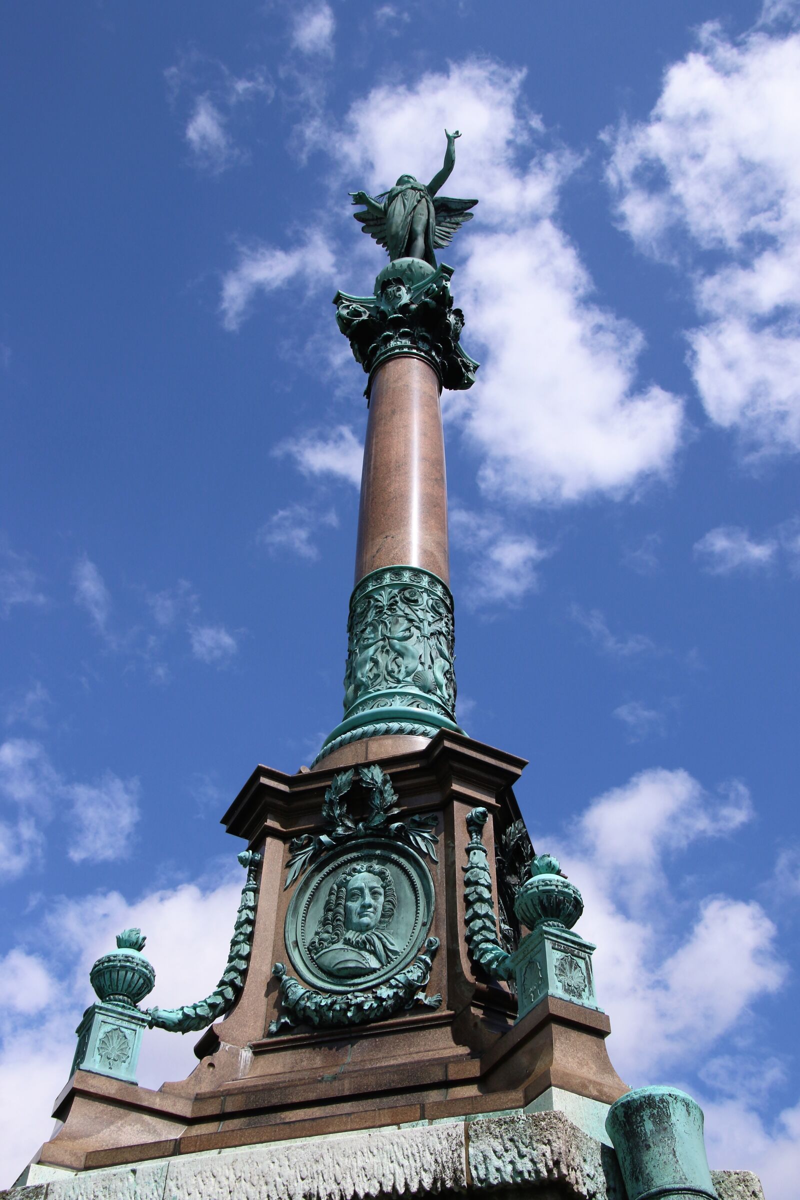 Canon EOS 7D Mark II sample photo. Blue, sky, clouds, face photography