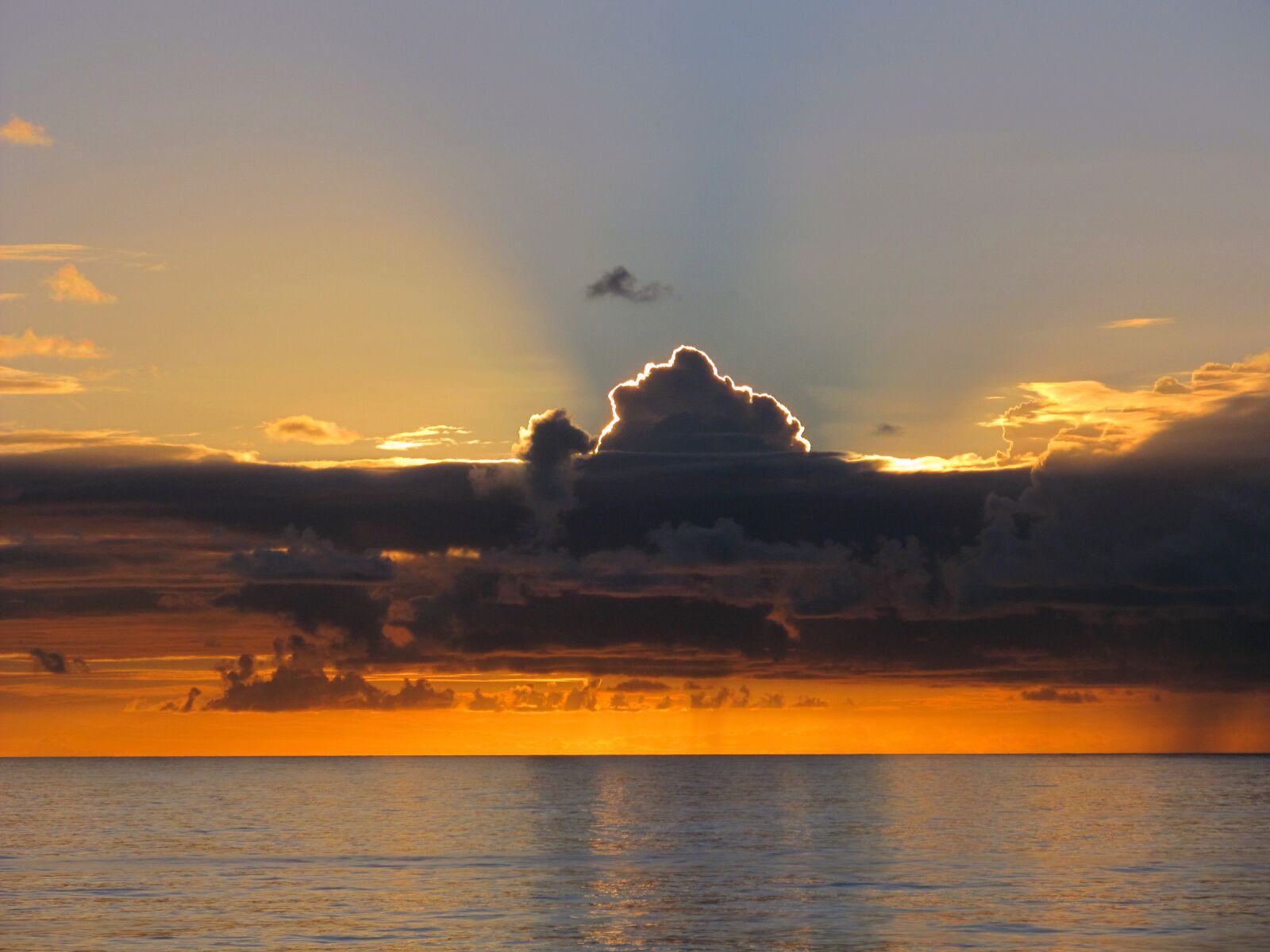 Canon PowerShot SX130 IS sample photo. Clouds, fire, ocean, royalty photography