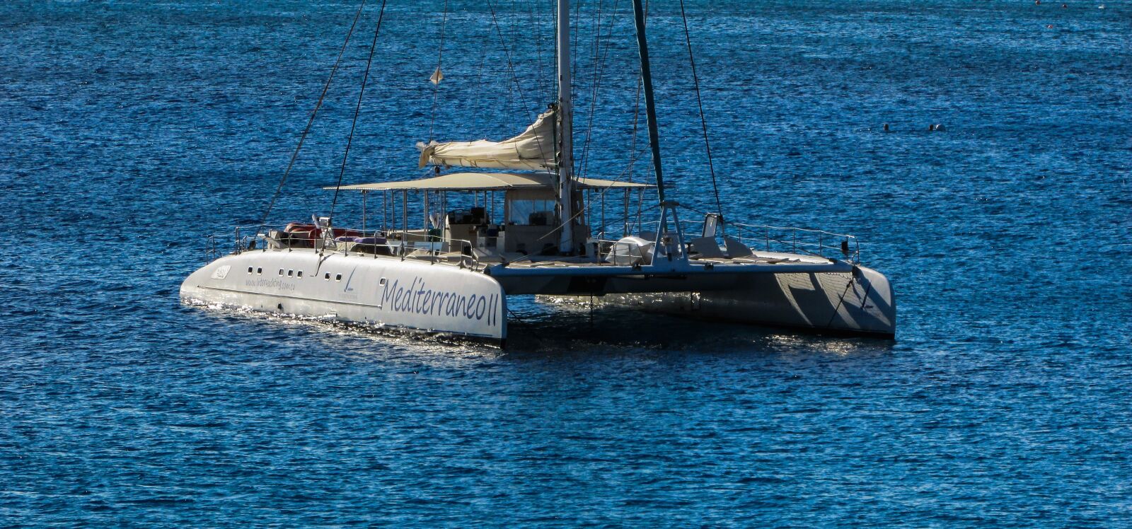 Canon PowerShot SX400 IS sample photo. Catamaran, sea, blue photography