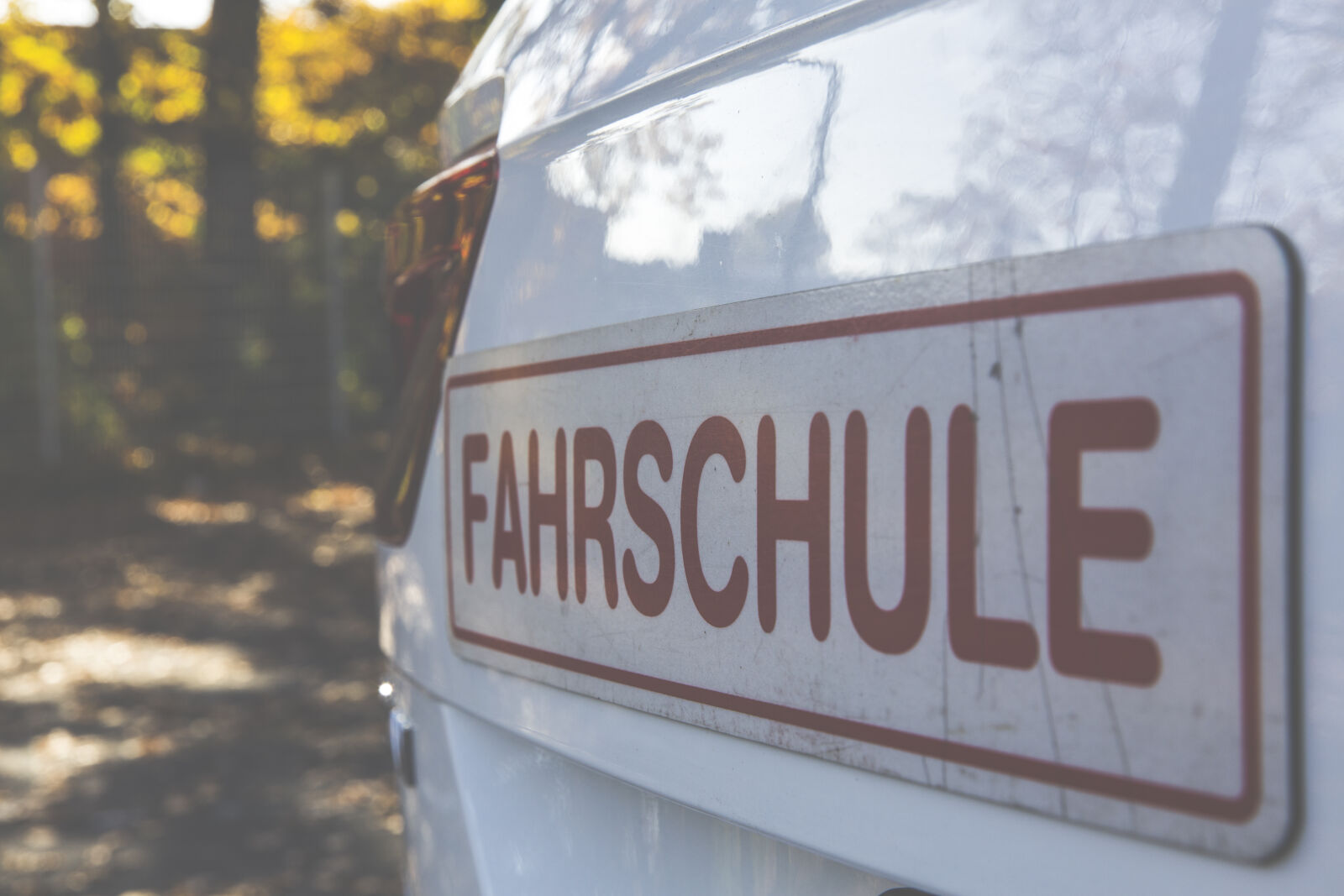 Canon EF 24-70mm F2.8L II USM sample photo. Sign, trees, car, vehicle photography