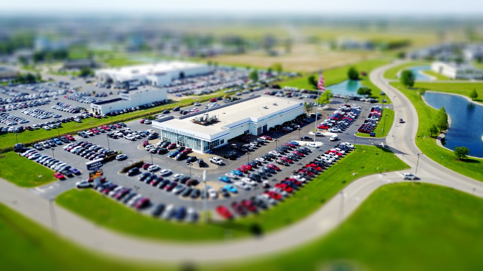 DJI FC220 sample photo. Blur, building, business, cars photography