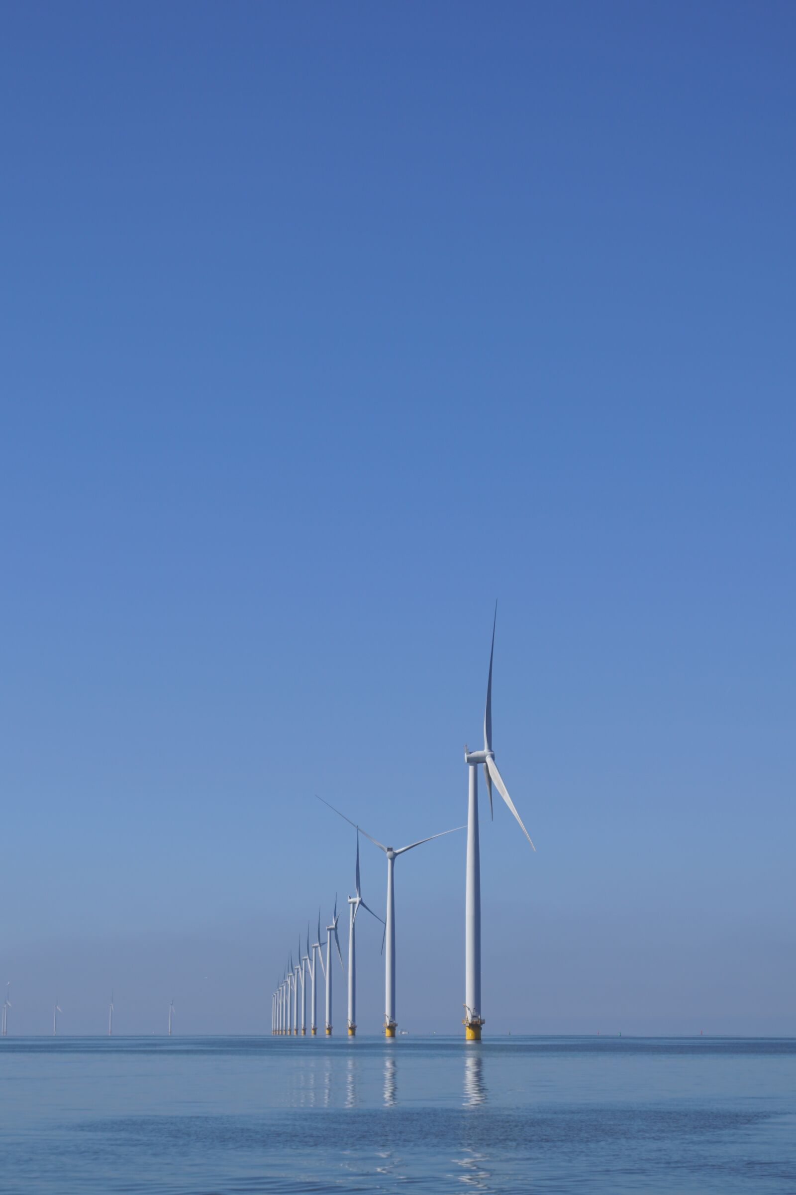 Sony SLT-A68 sample photo. Ijsselmeer, water, windmills photography