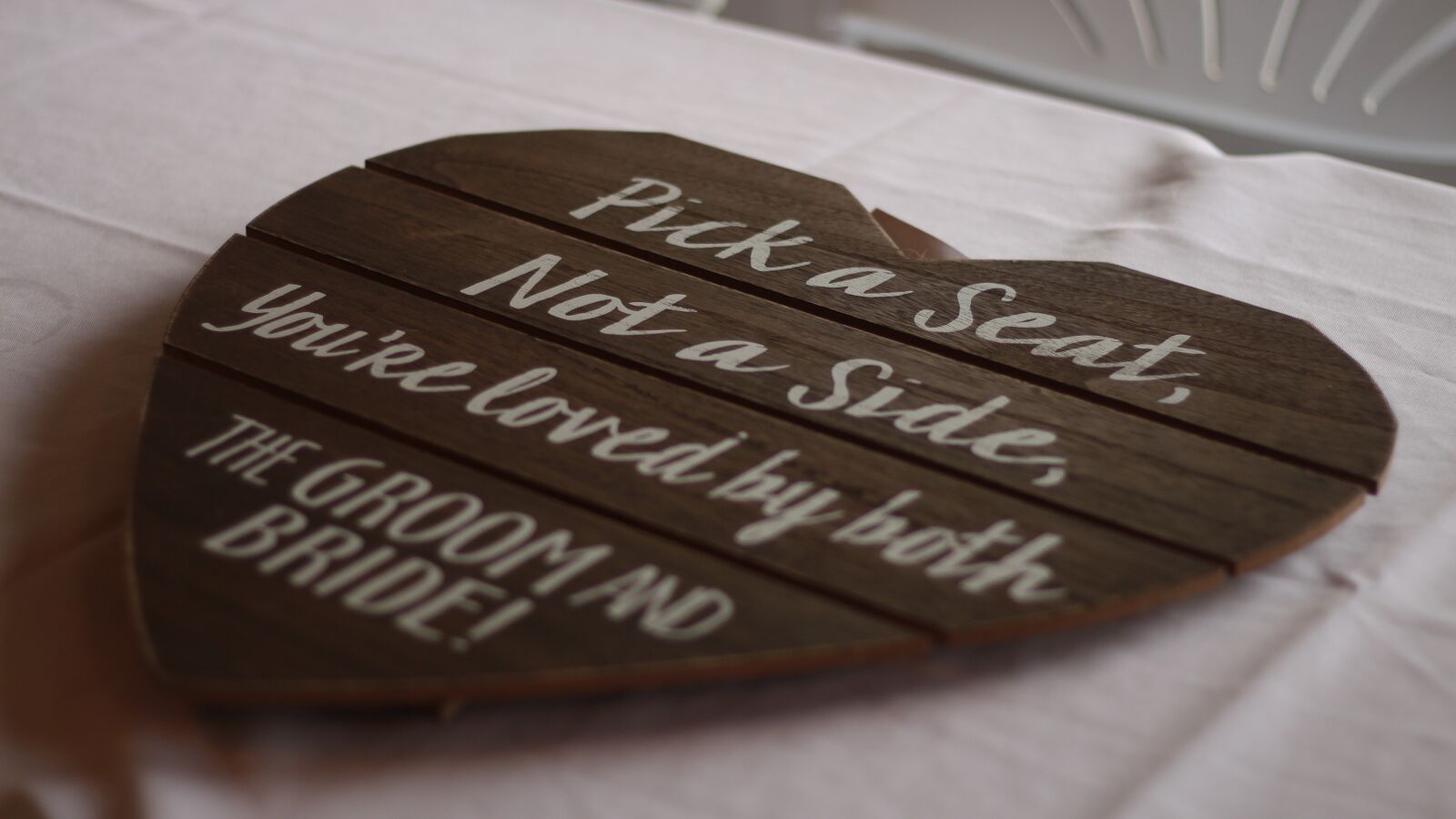 Canon EF 50mm F1.8 STM sample photo. Wedding, sign, seat photography