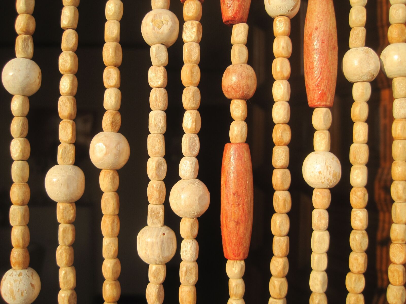 Canon PowerShot SD1200 IS (Digital IXUS 95 IS / IXY Digital 110 IS) sample photo. Wood, curtain, beads photography