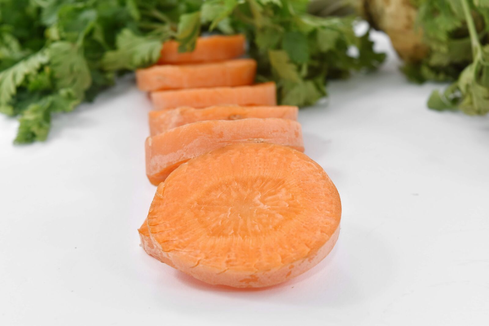 Nikon D5500 sample photo. Slices, healthy, food, carrot photography