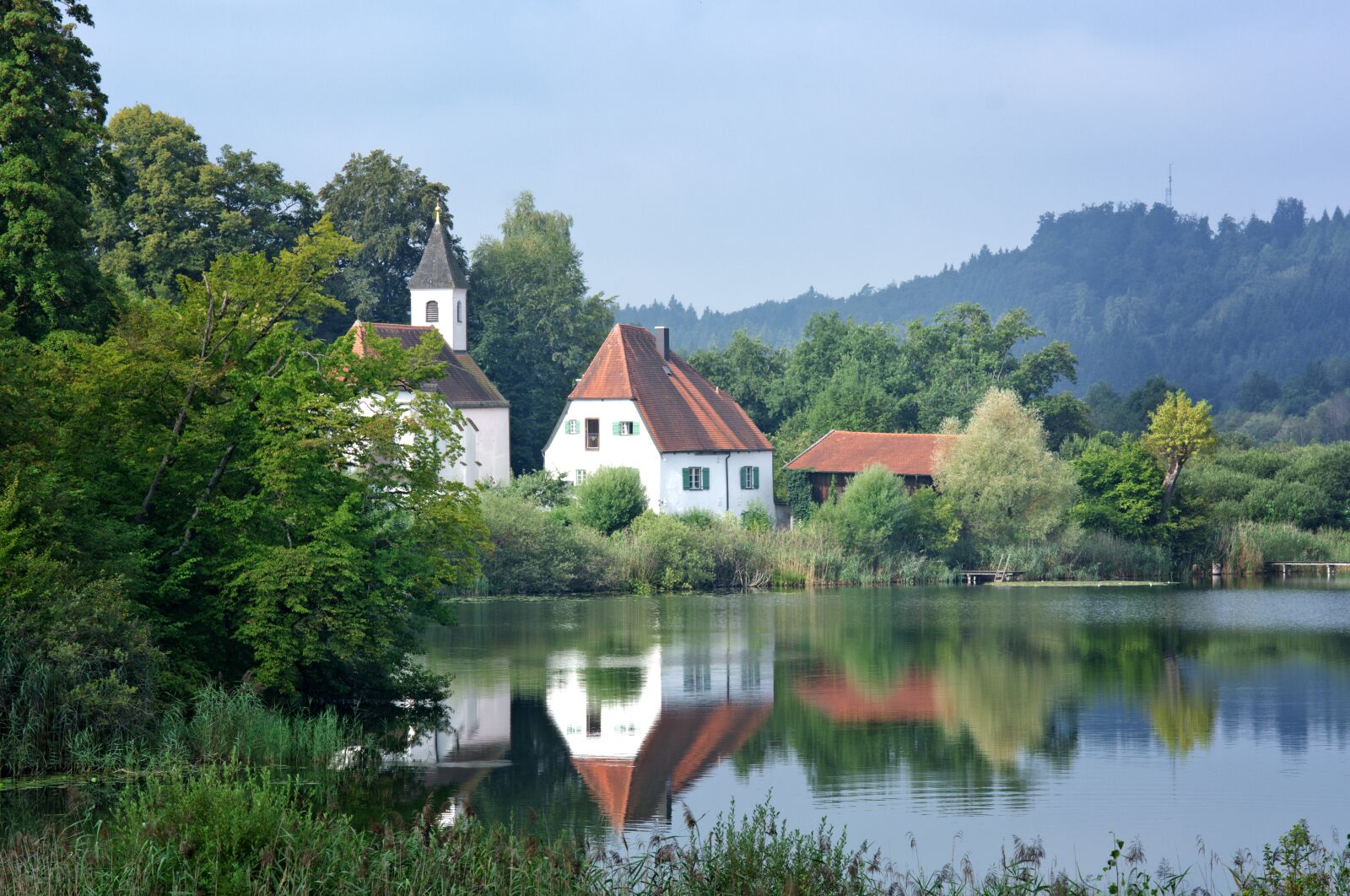 55.0-200.0mm f/4.0-f/5.6 sample photo. Landscape, monastery, lake photography
