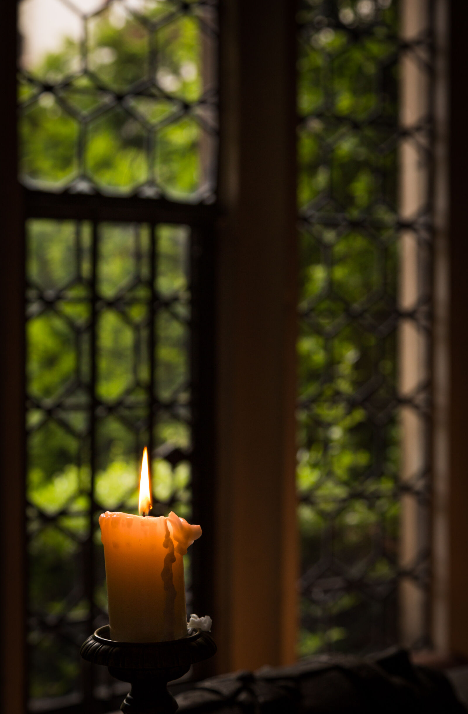 Canon EF 24-105mm F4L IS USM sample photo. Yellow, lit, candle, in photography