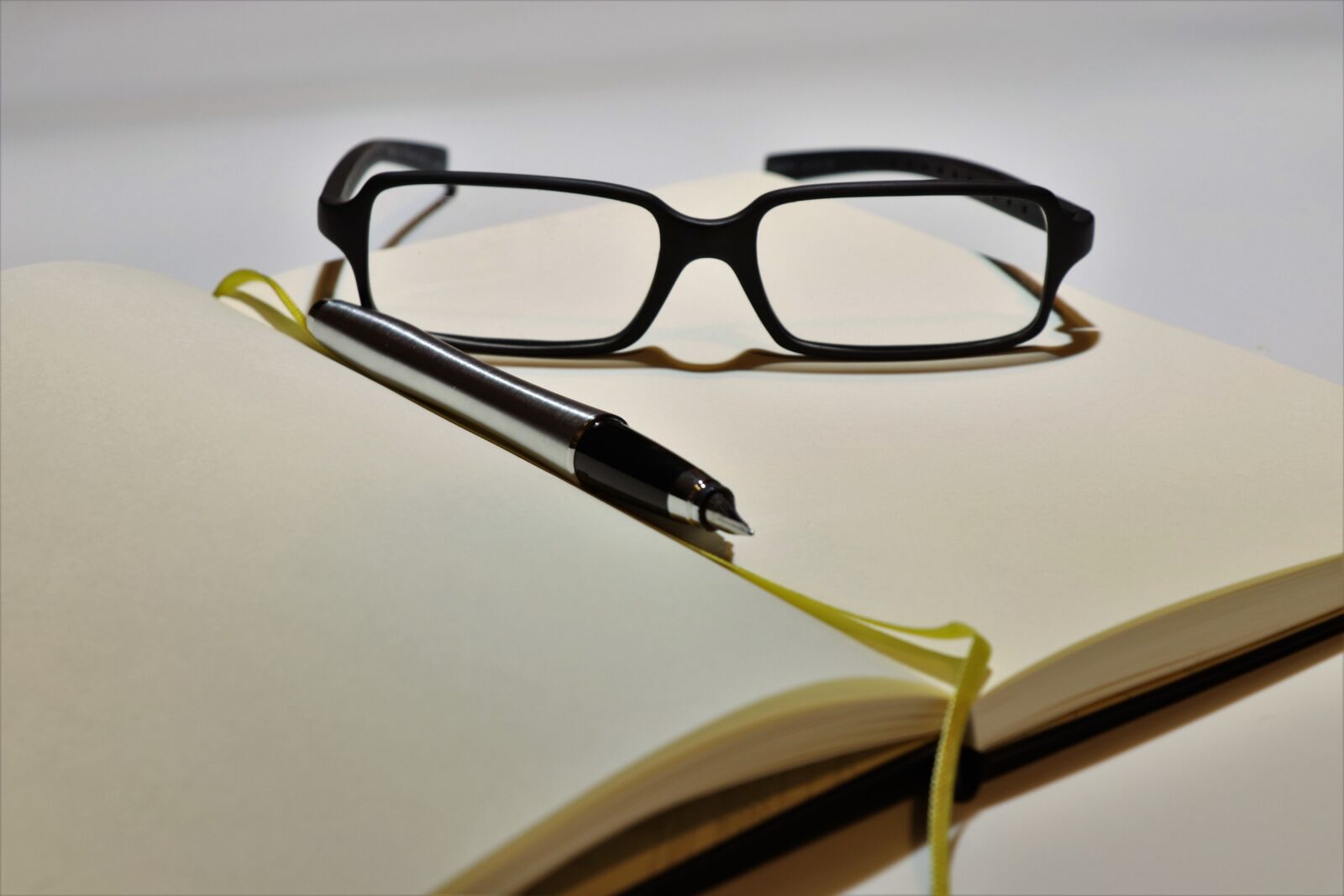 Canon EOS 77D (EOS 9000D / EOS 770D) sample photo. Notebook, glasses, business photography