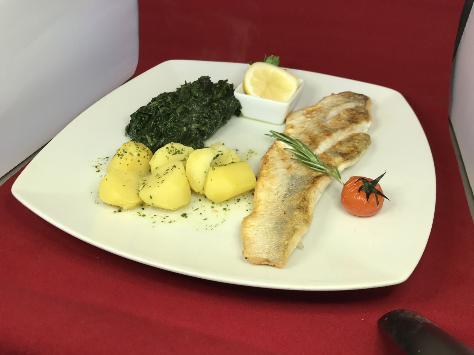iPhone 7 back camera 3.99mm f/1.8 sample photo. Saithe fillet, spinach, main photography