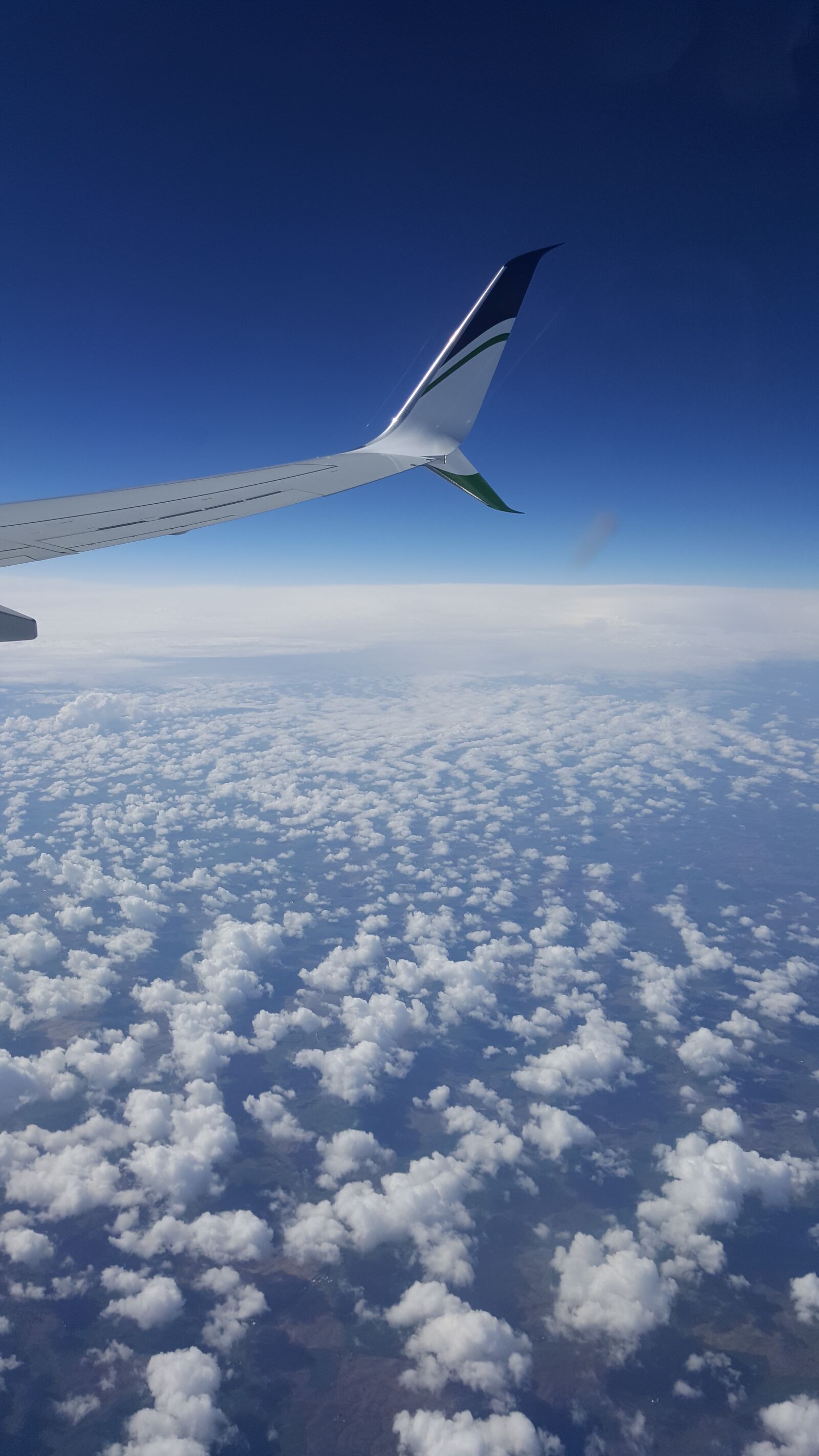 Samsung Galaxy Note5 sample photo. Plane, clouds, view photography