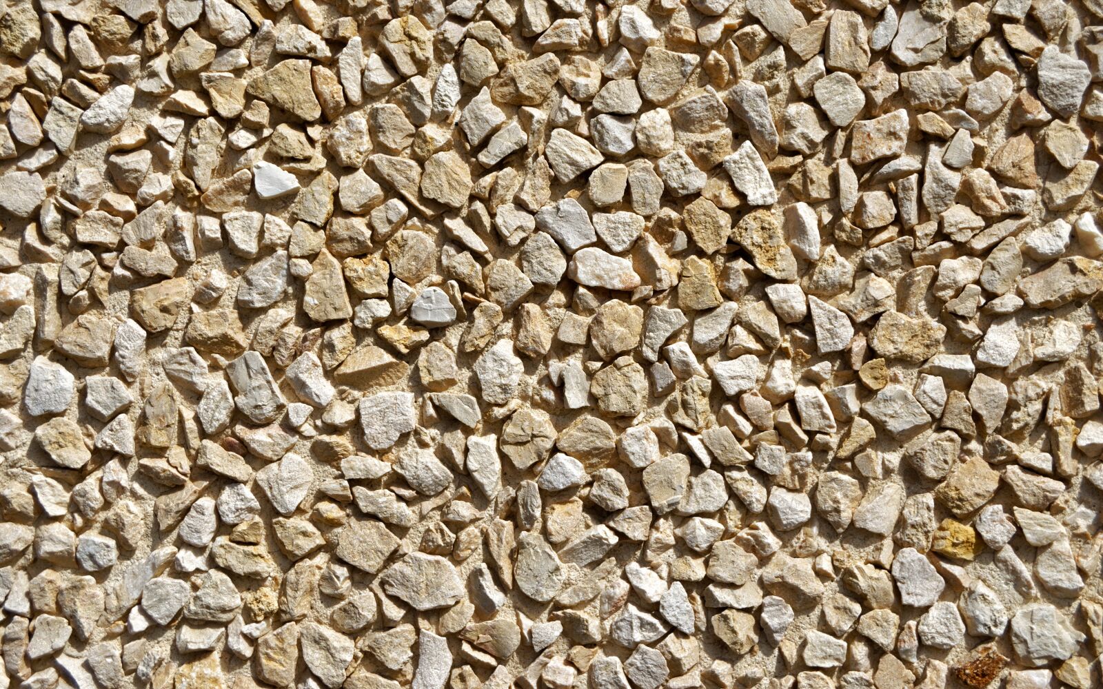 Nikon D5100 sample photo. Wall, decorative, pebbles photography
