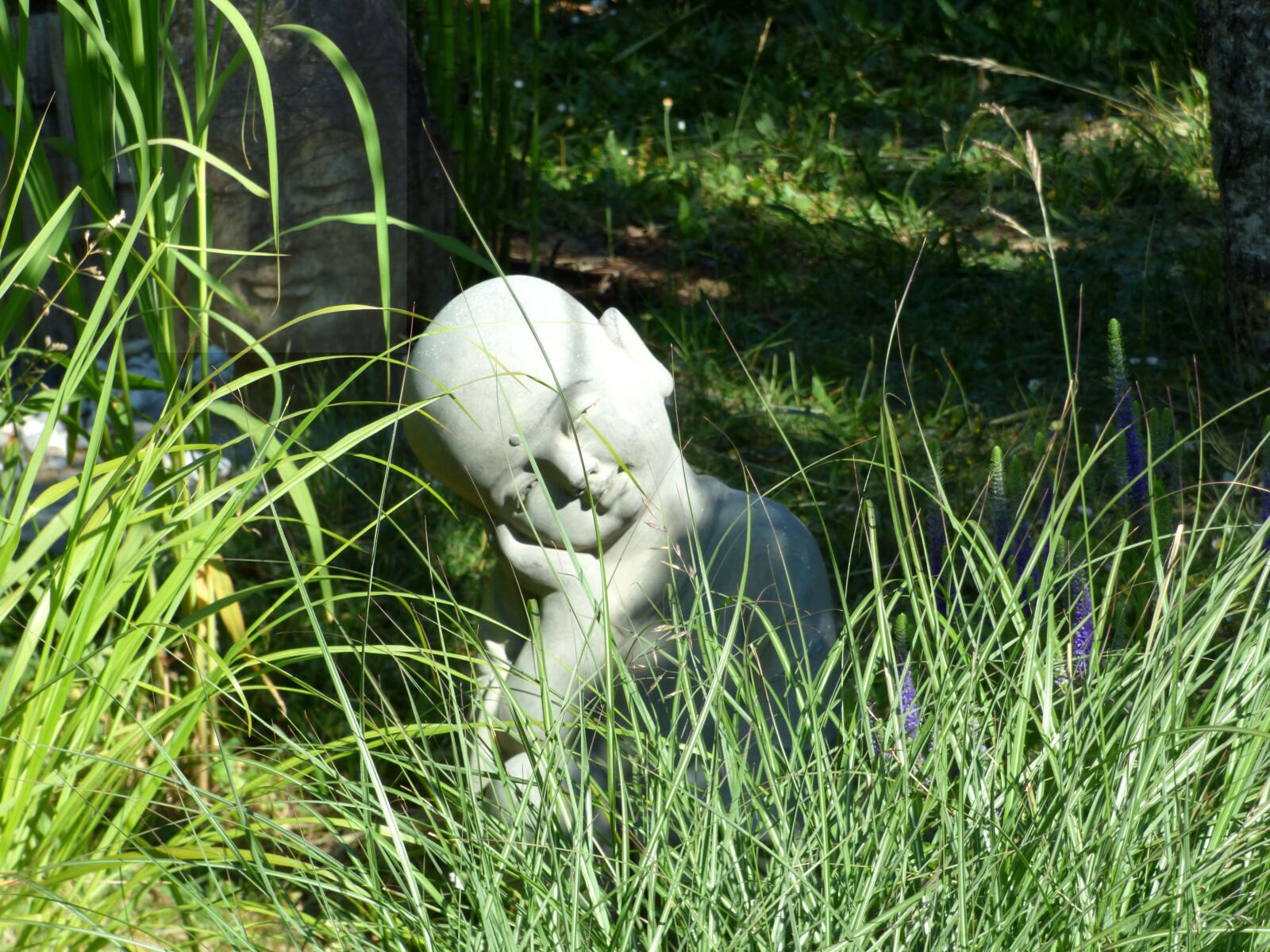 Panasonic DMC-FZ72 sample photo. Statue, zen, grass photography