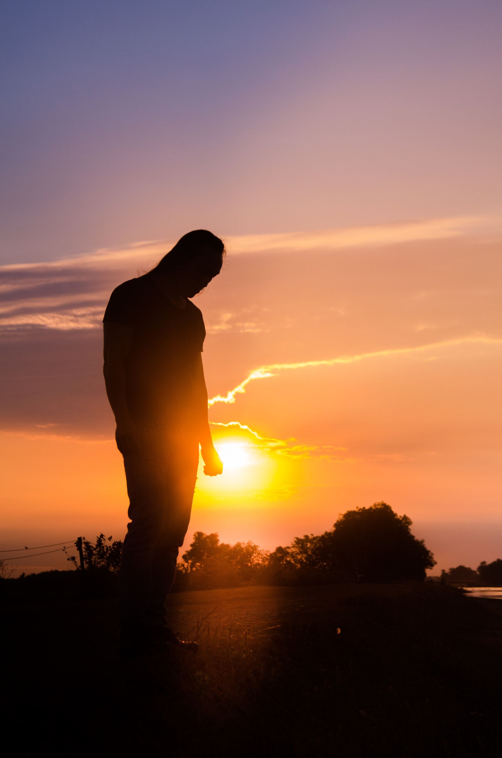 Nikon D5100 sample photo. Reverse sun, people, lonely photography