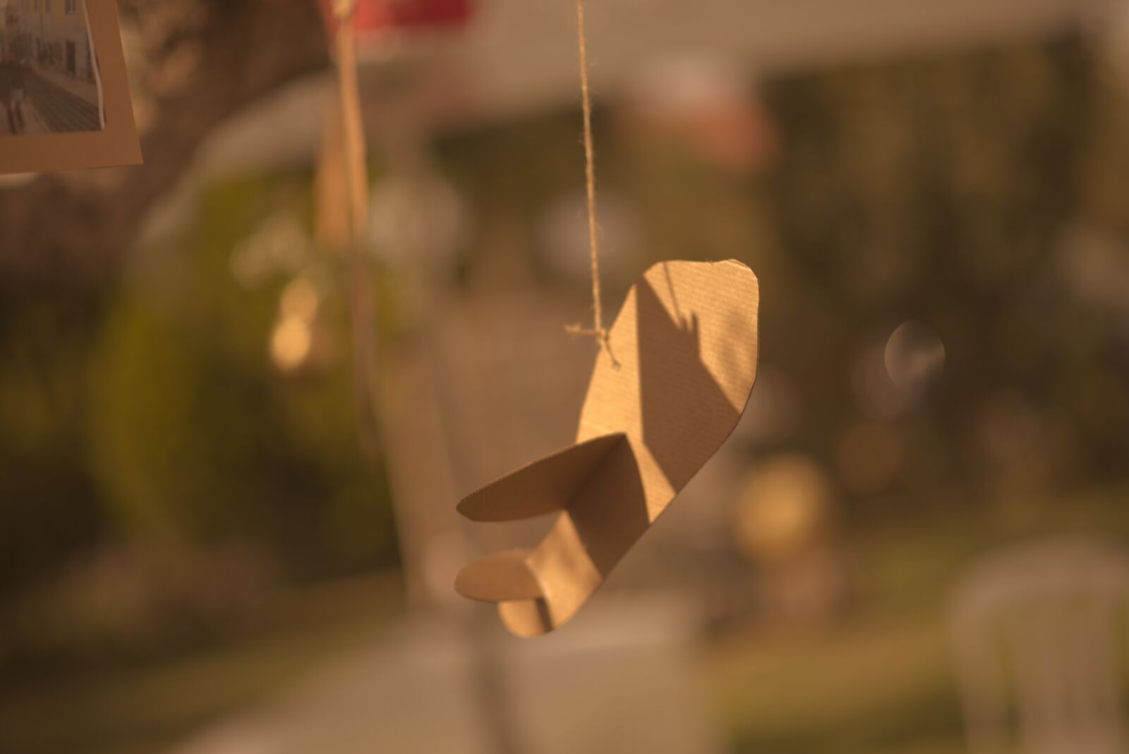 Nikon D750 sample photo. Paper, plane, hanging photography