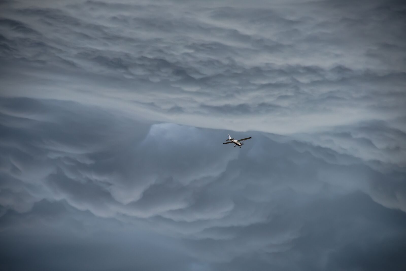 Nikon D810 sample photo. Storm, plane, flying photography