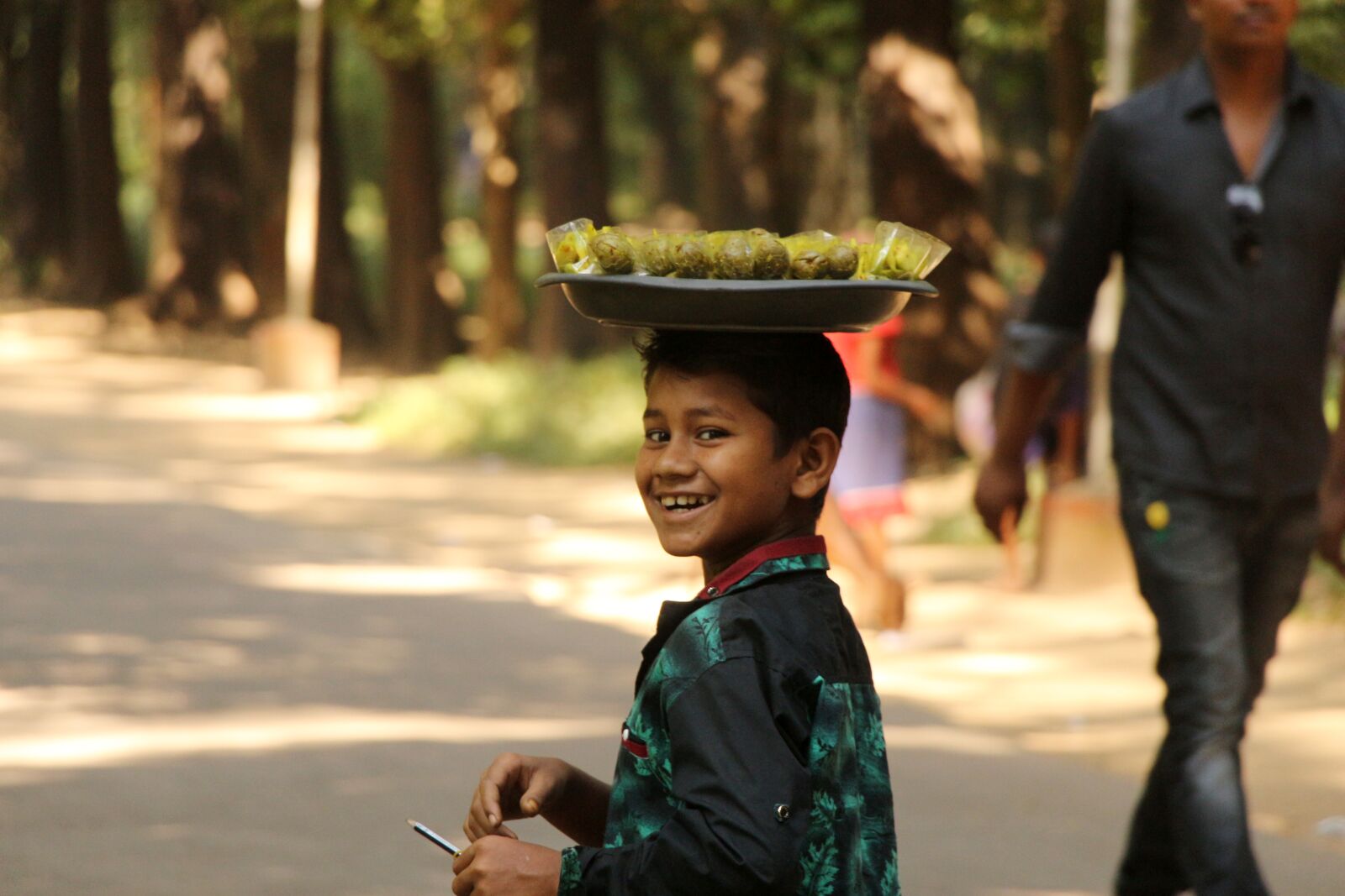 Canon EOS 700D (EOS Rebel T5i / EOS Kiss X7i) sample photo. Smile, child, merchant photography