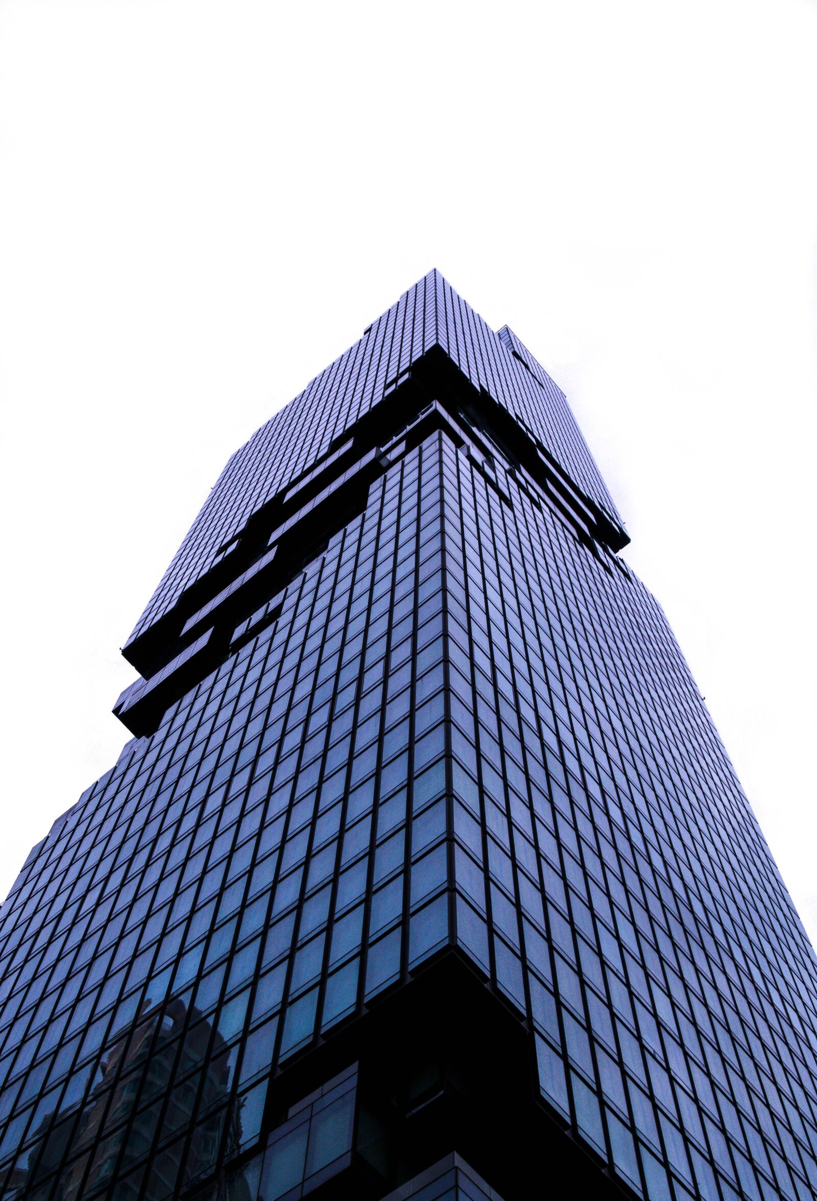 Olympus OM-D E-M10 III sample photo. Skyscraper, before sunset, contrast photography