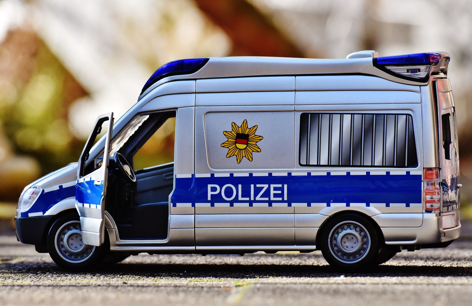 Nikon D7200 sample photo. Police car, team bus photography