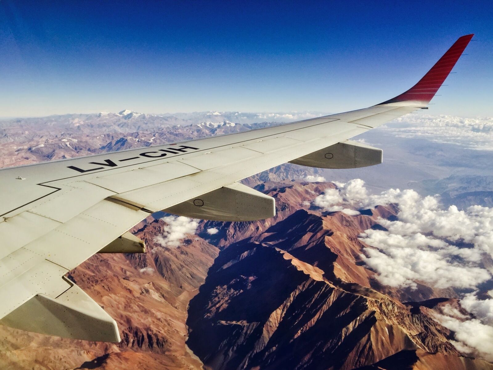 Apple iPhone 6 sample photo. Flight, sky, mountains photography